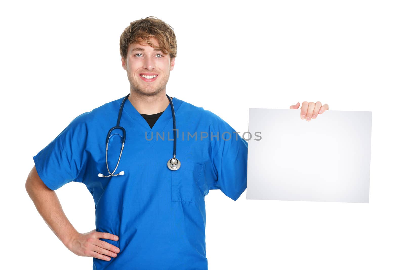 Medical sign. Male doctor / nurse showing and holding blank white paper sign board with copy space for text or message. Young medical professional caucasian man isolated on white background.