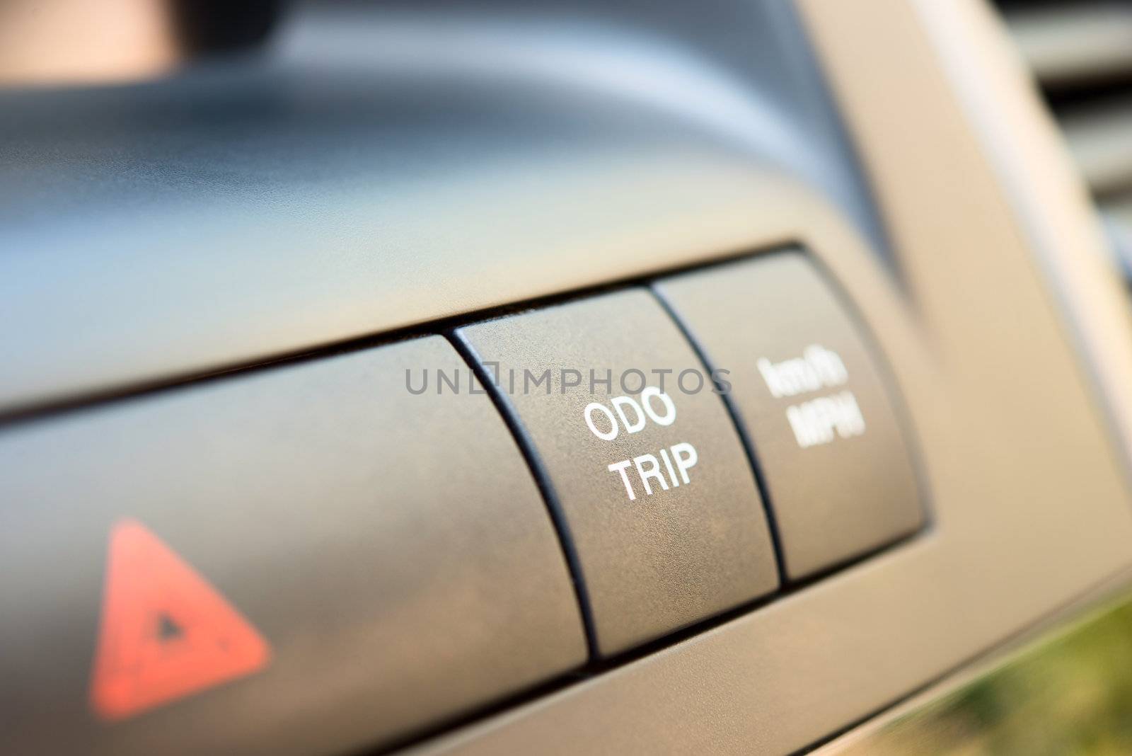 Trip and odometer buttons in a modern car