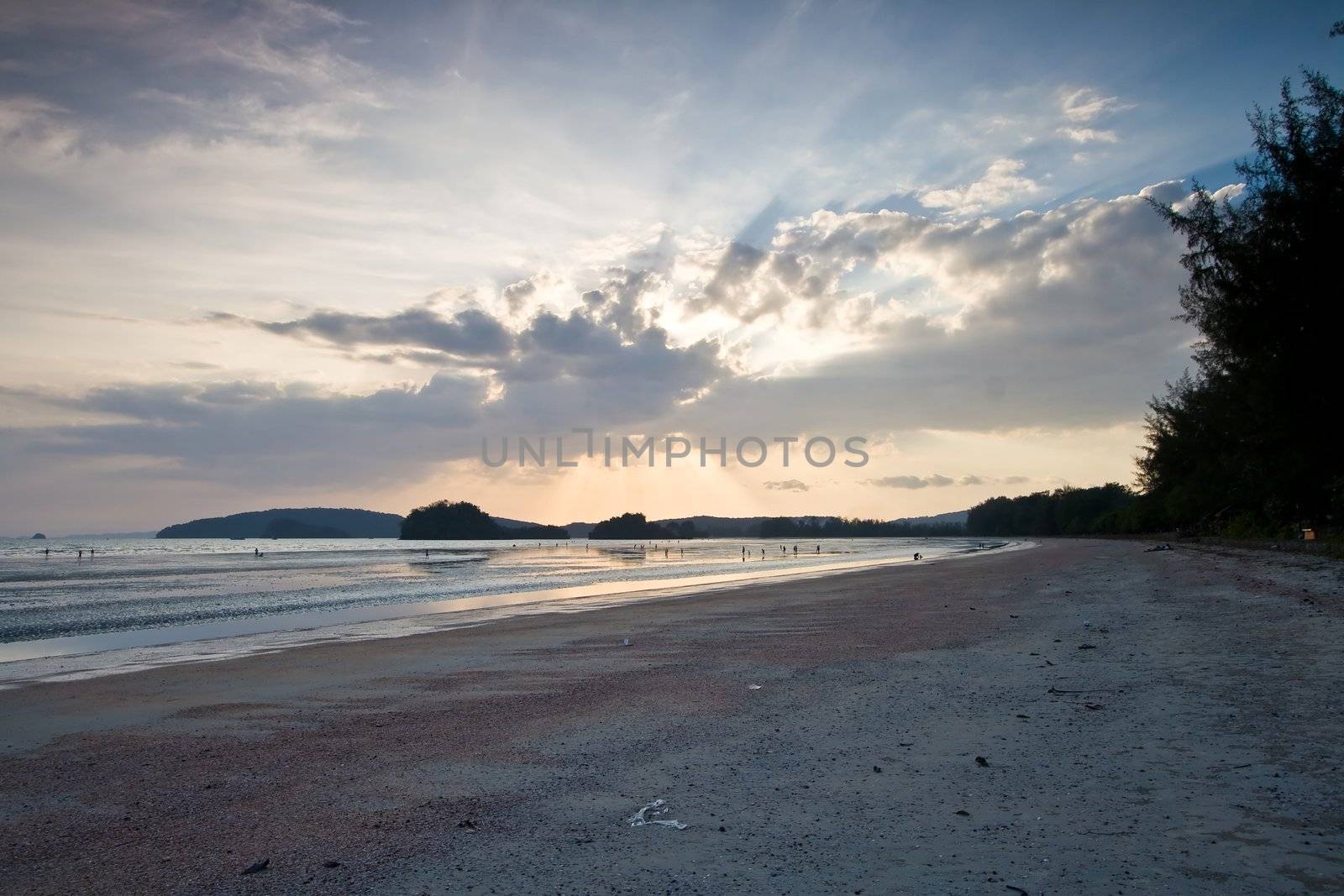 Beautiful Light through the cloud on Sunset at Phranang Beach, near Phuket Thailand