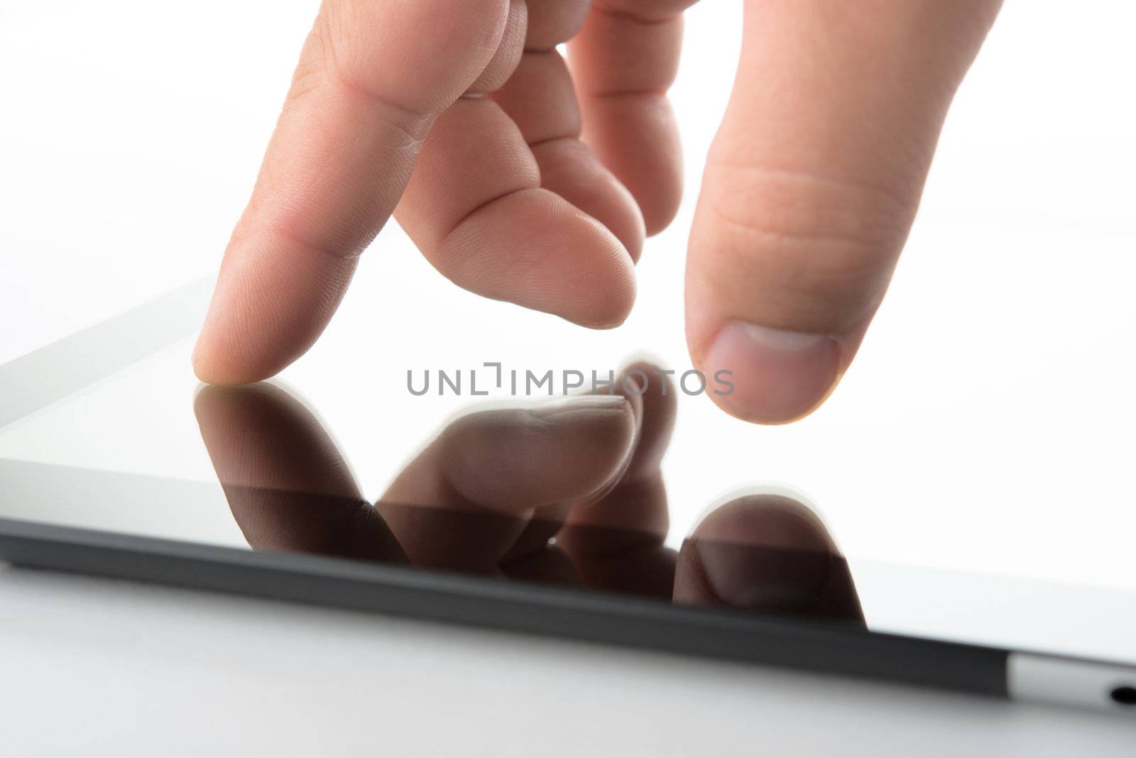 close view of hand on contemporary tablet pc