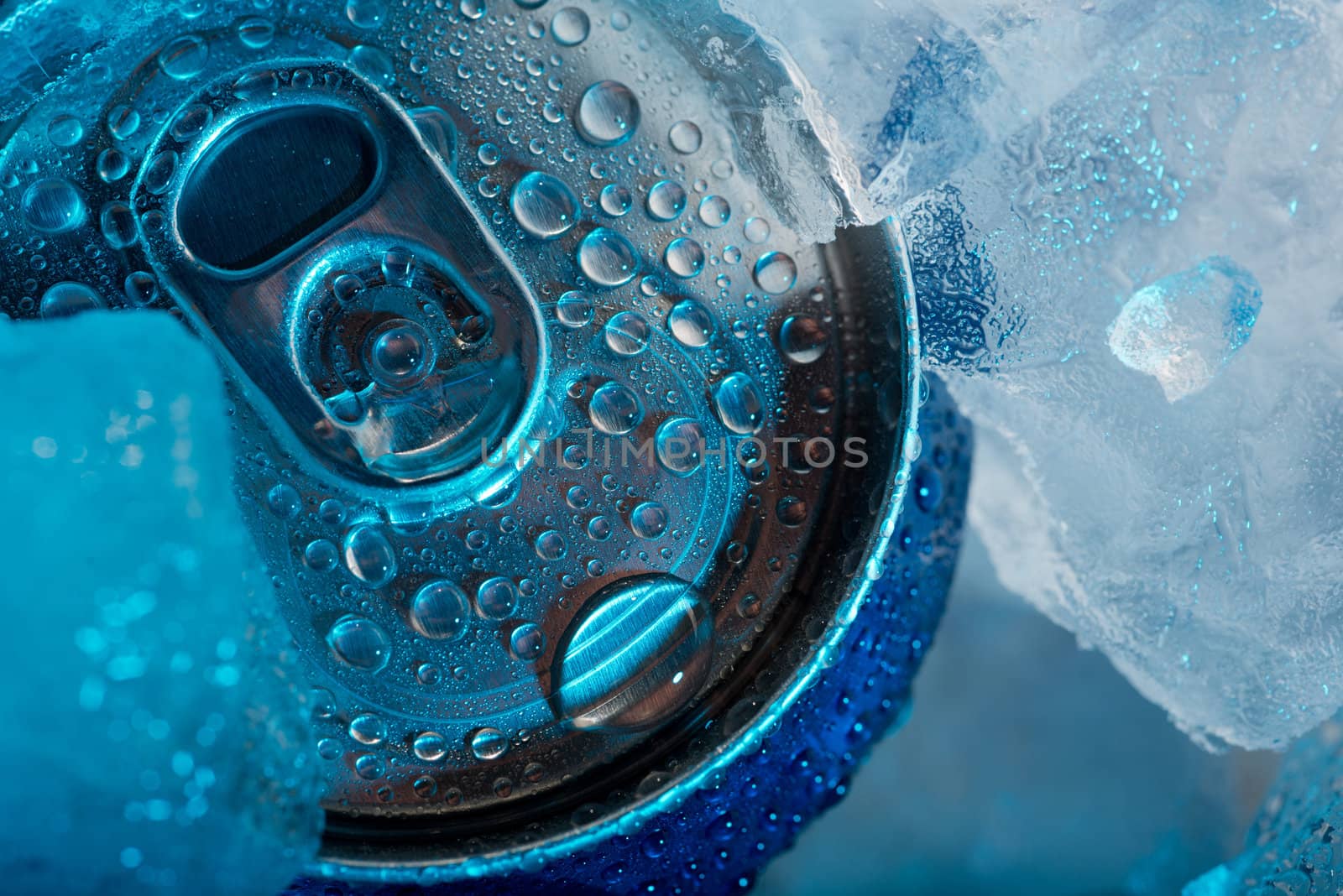 Metallic can opening hinge under ice and cold light