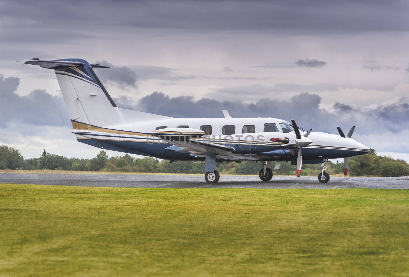 Private propeller plane parking at rural airport