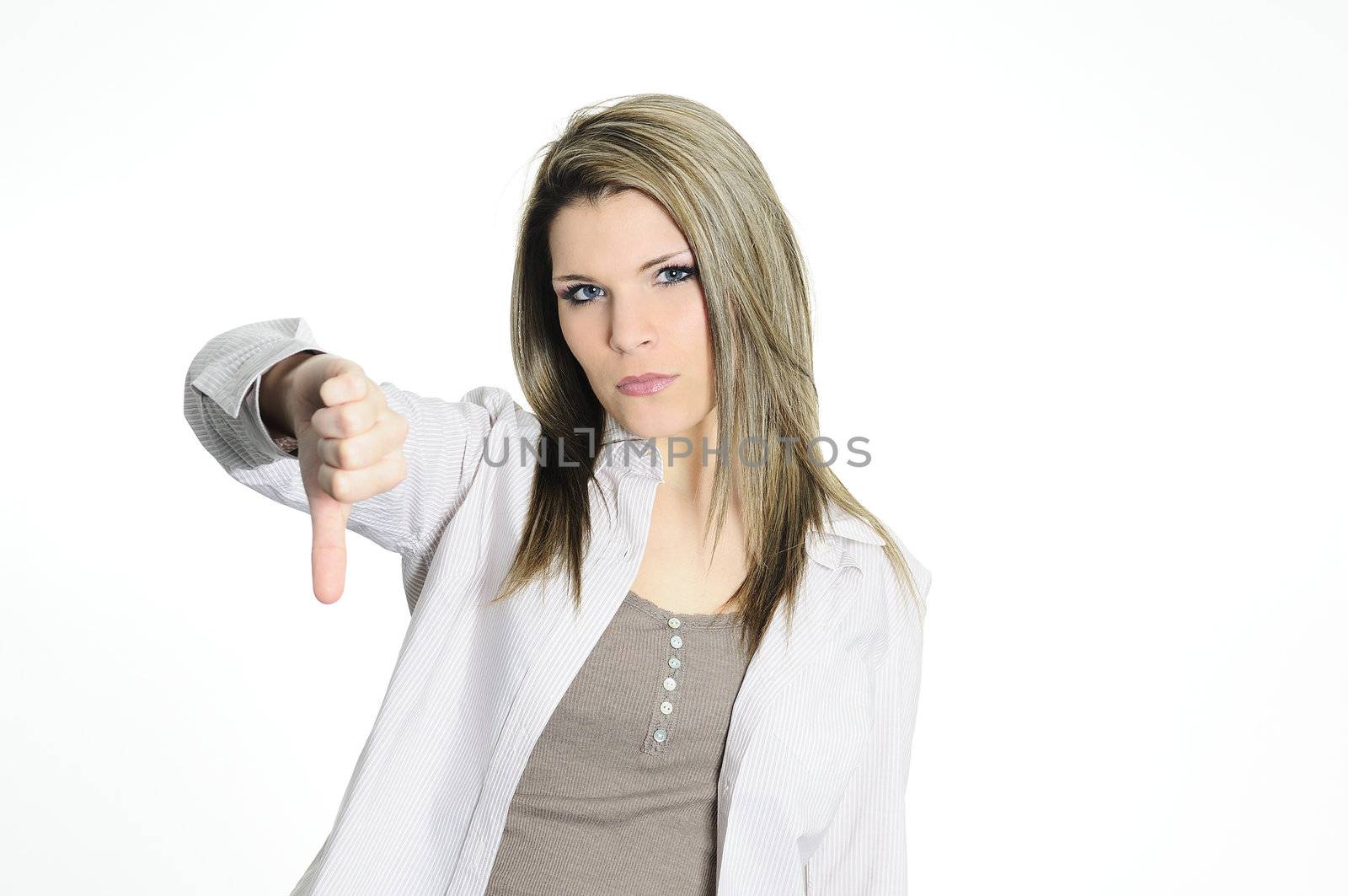 young adult woman giving thumbs down. isolated on white