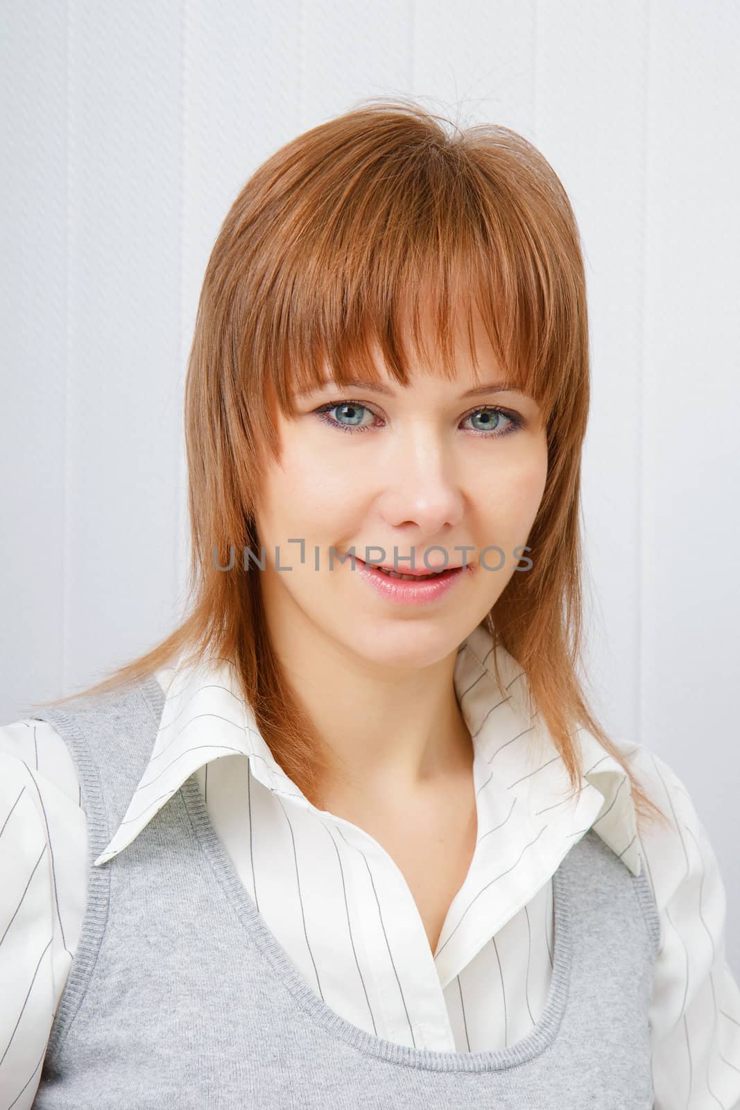 Portrait of an attractive young business woman in office