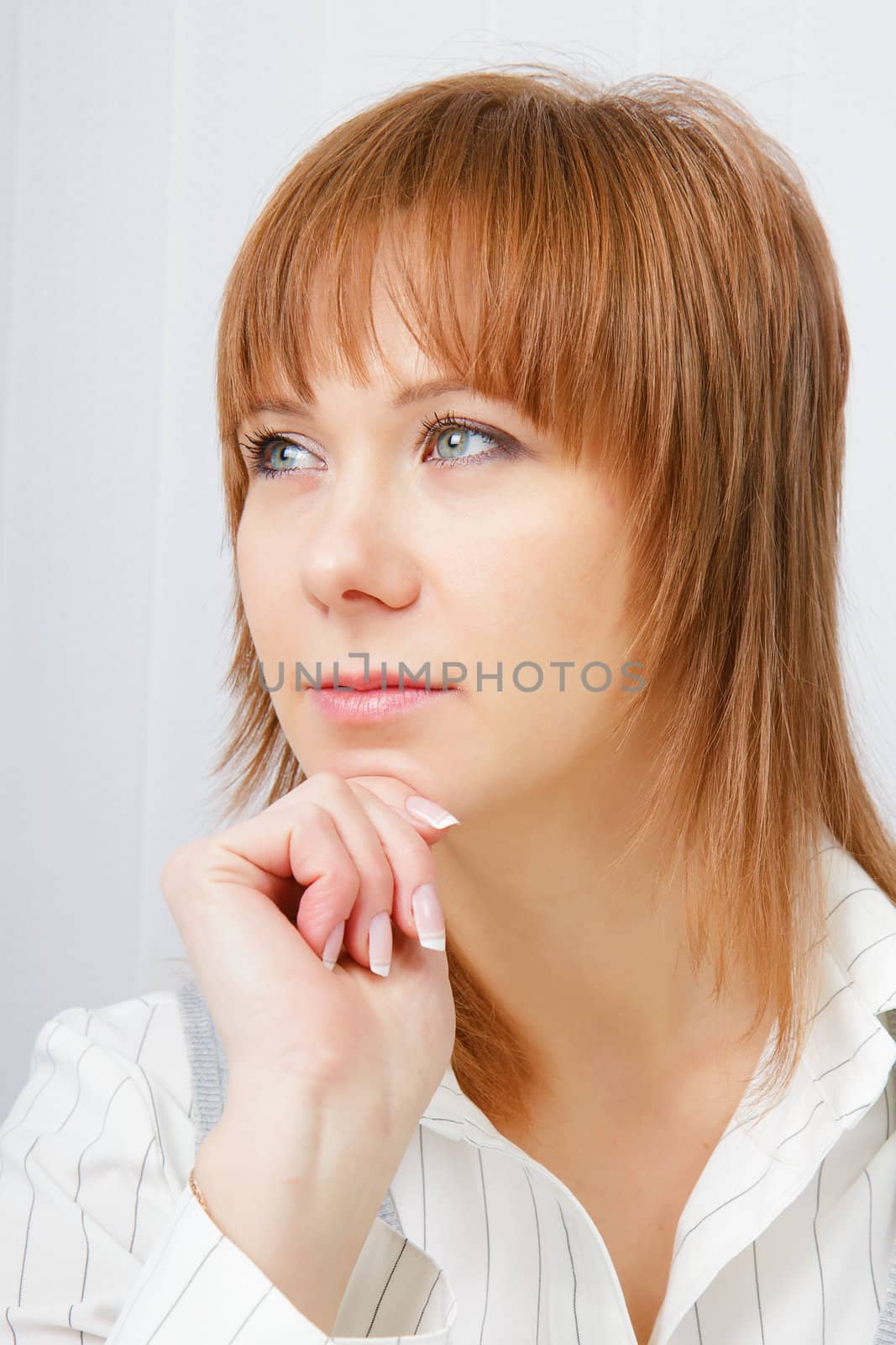 Portrait of an attractive young business woman in office