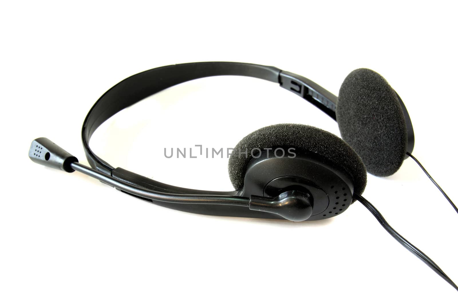 black headphones isolated on white background by nuchylee