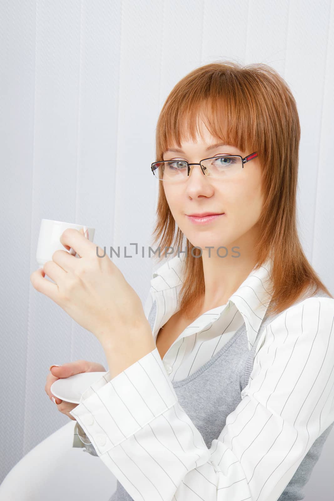 Portrait of an attractive young business woman in office