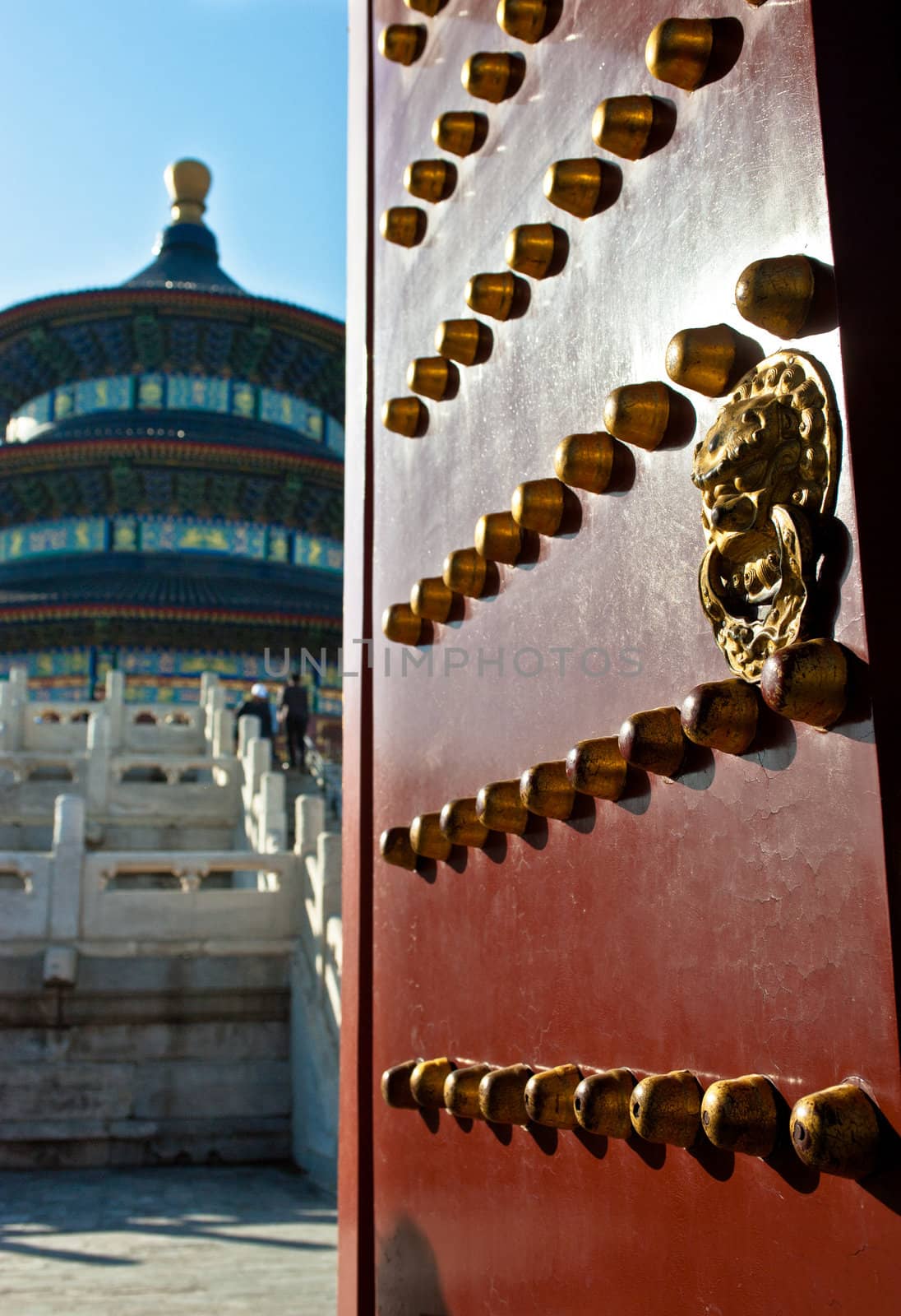 A red gate entry to the Temple of Heaven in Beijing, China.