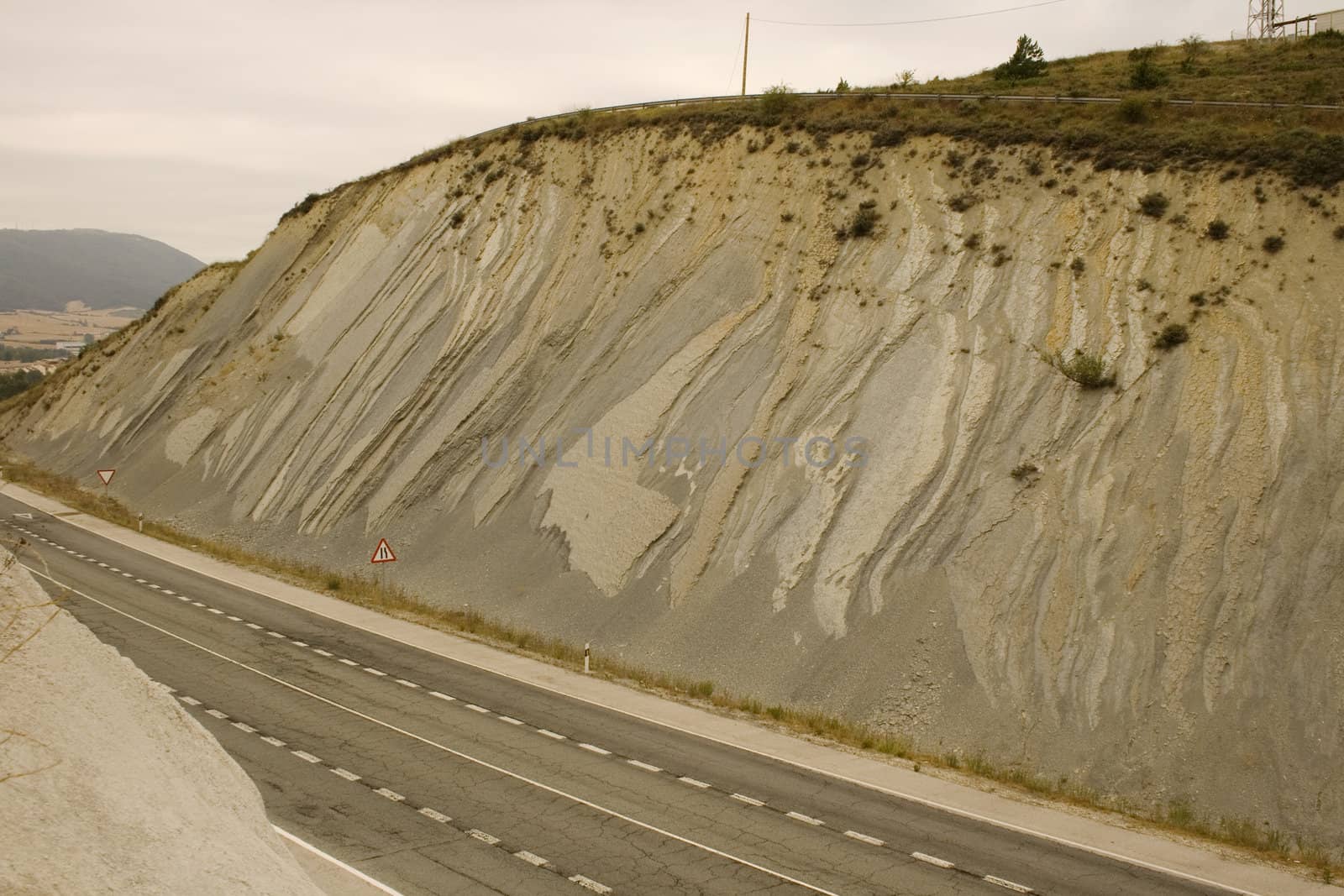 Clay hill and Road in the spanish countryside