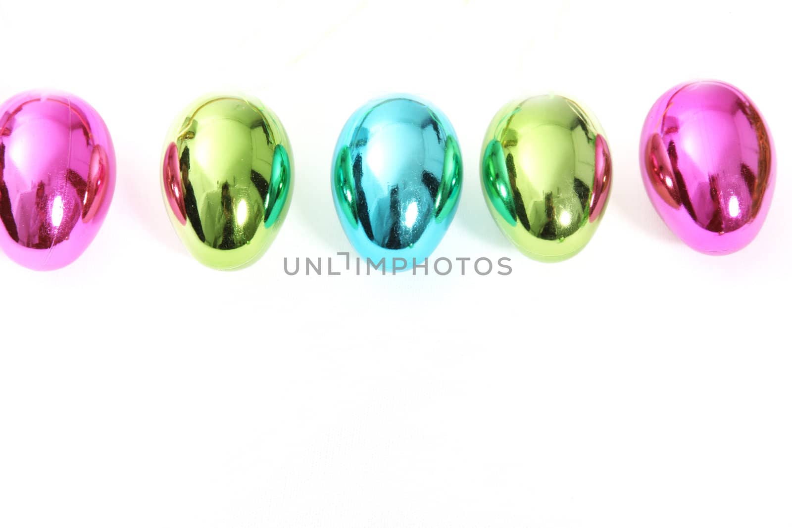 Line of vibrant shiny Easter Eggs by Farina6000