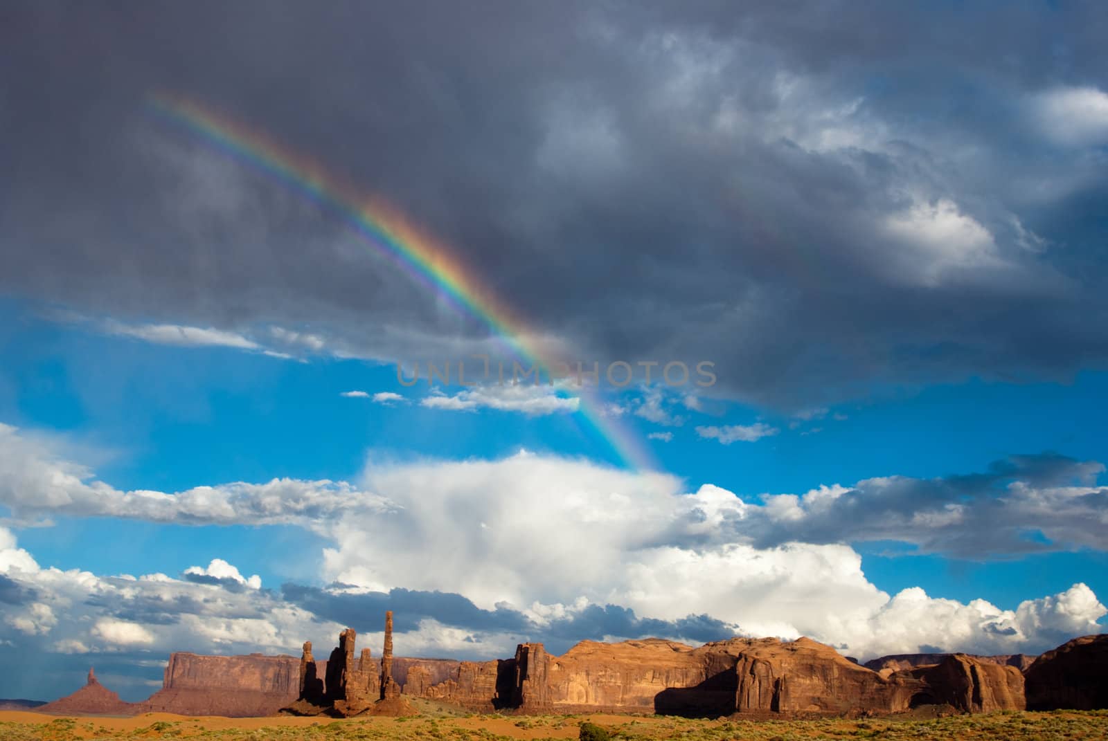 Rainbow over Monument Valley after the storm
