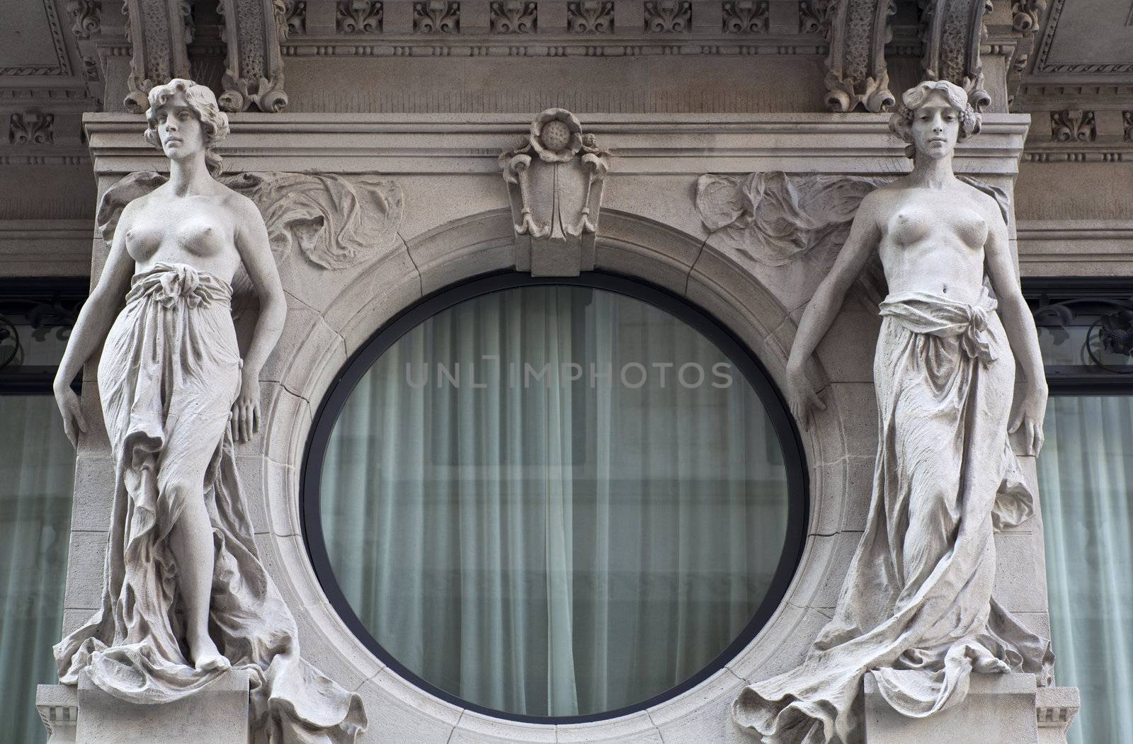 Women statues on a building, Trieste - Italy