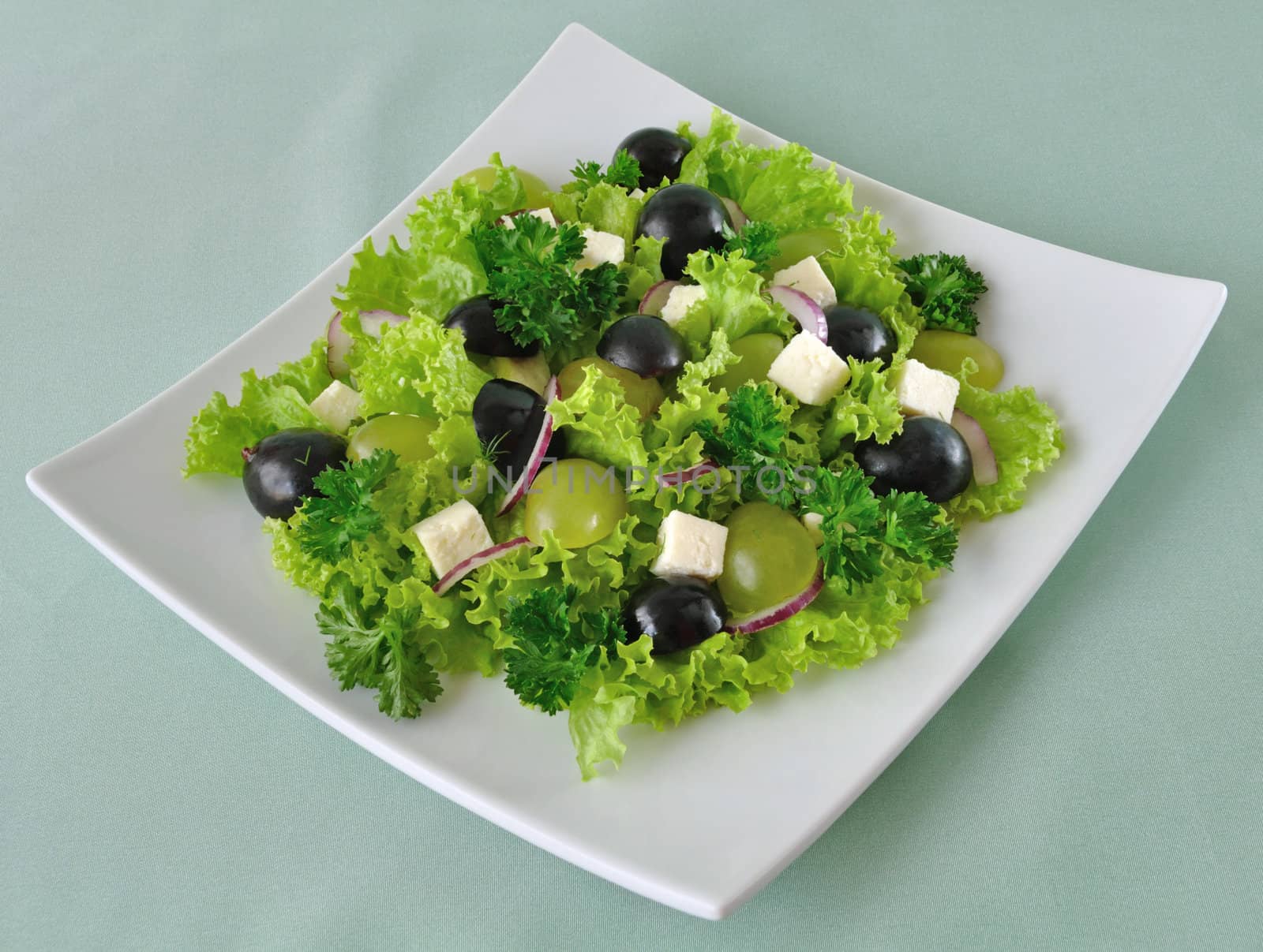 Salad of lettuce with cheese and grapes by Apolonia