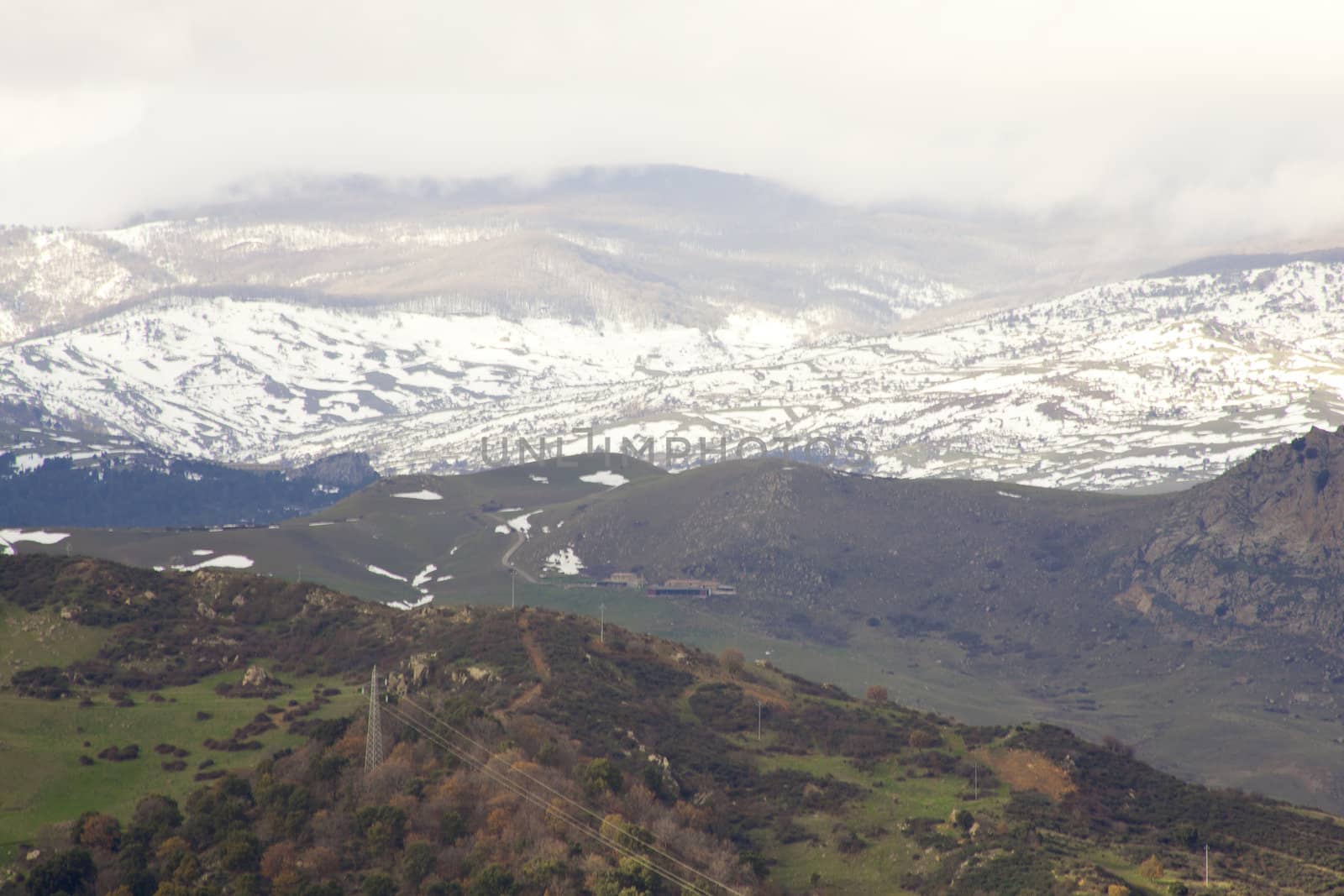 View of Monti Nebrodi with snow and clouds