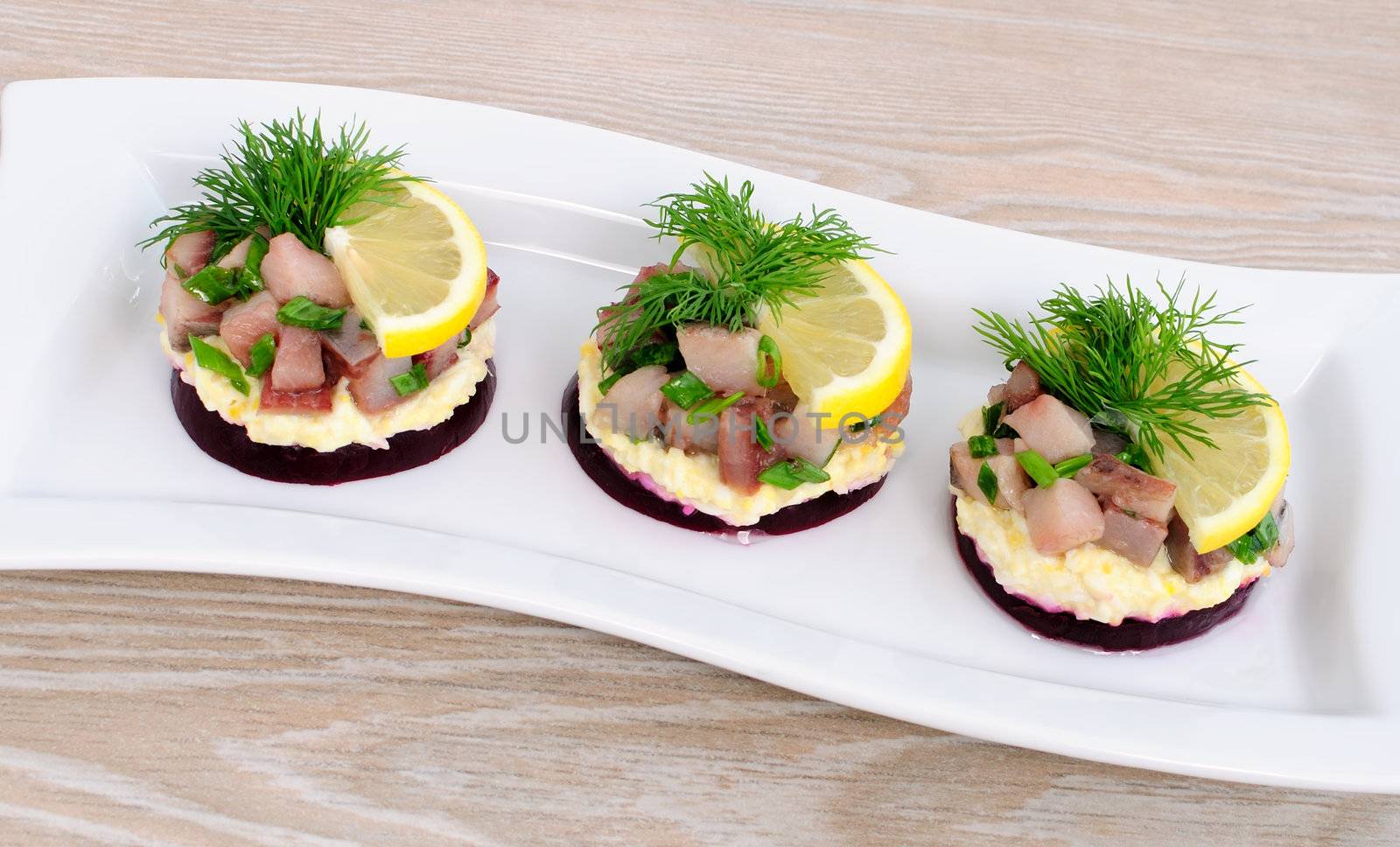 Appetizer with herring and beets by Apolonia