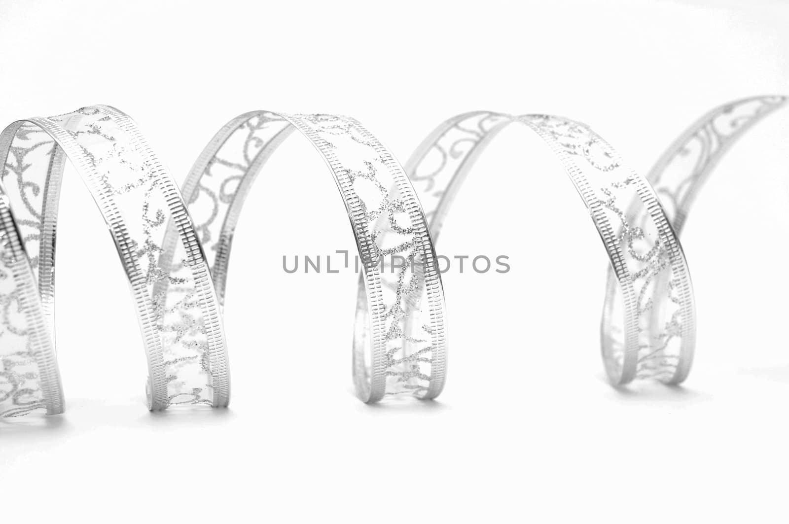 silver ribbon serpentine on a white background by inxti