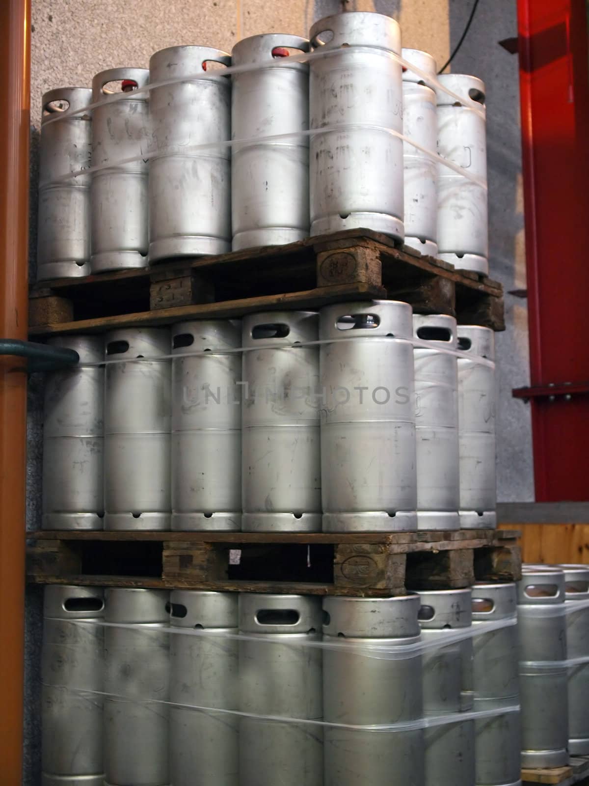 Beer kegs barrels in a brewery pub       