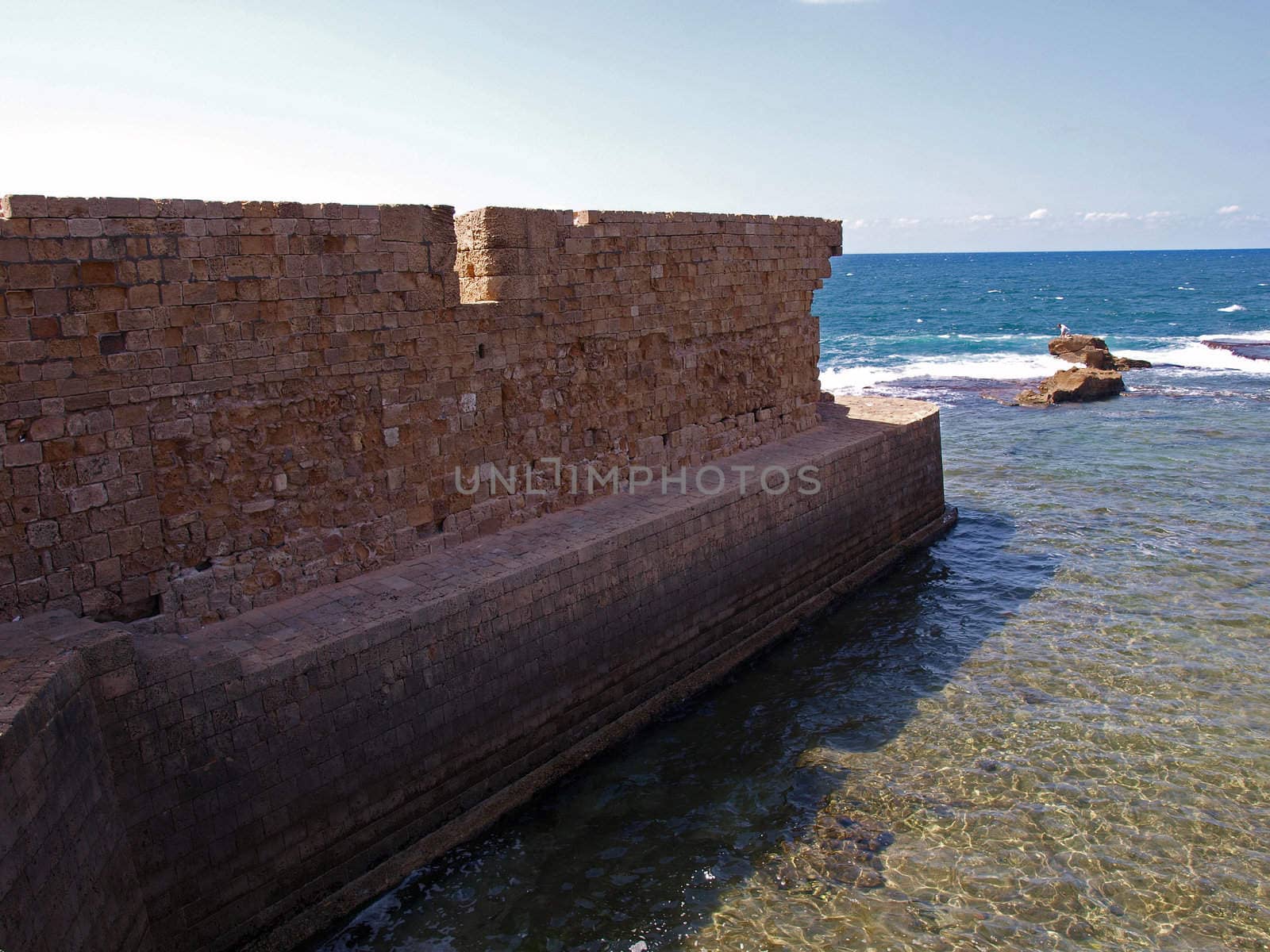 Sea wall of Acre Akko Israel by Ronyzmbow