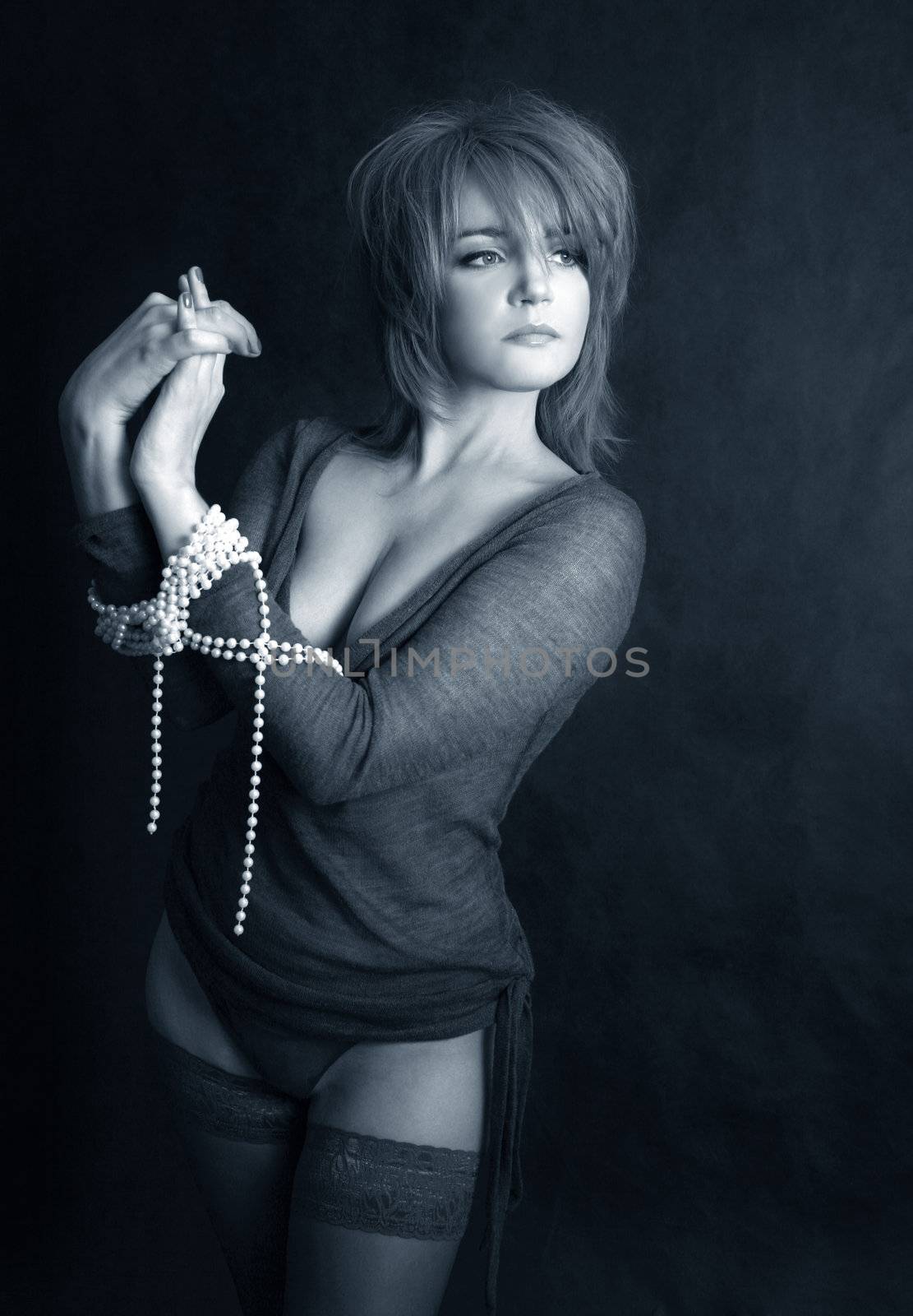 Portrait of a fine woman with a beads