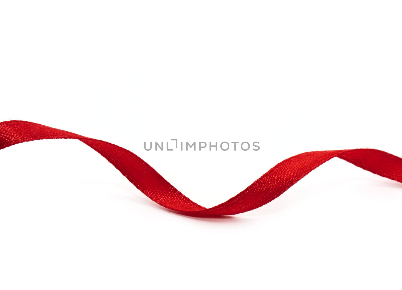 Red ribbon isolated on white background