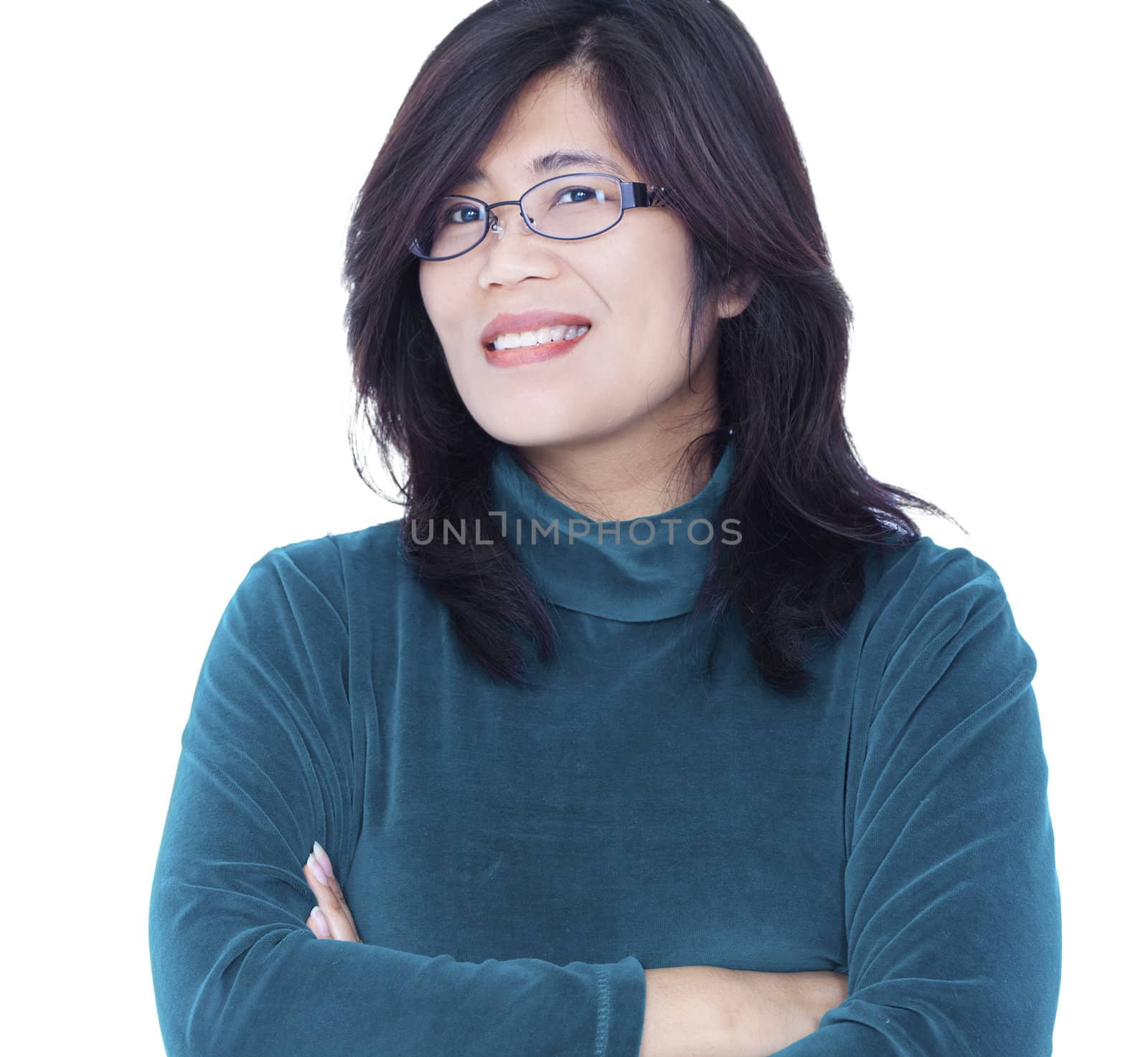 Confident smiling Asian female in green shirt, arms crossed by jarenwicklund