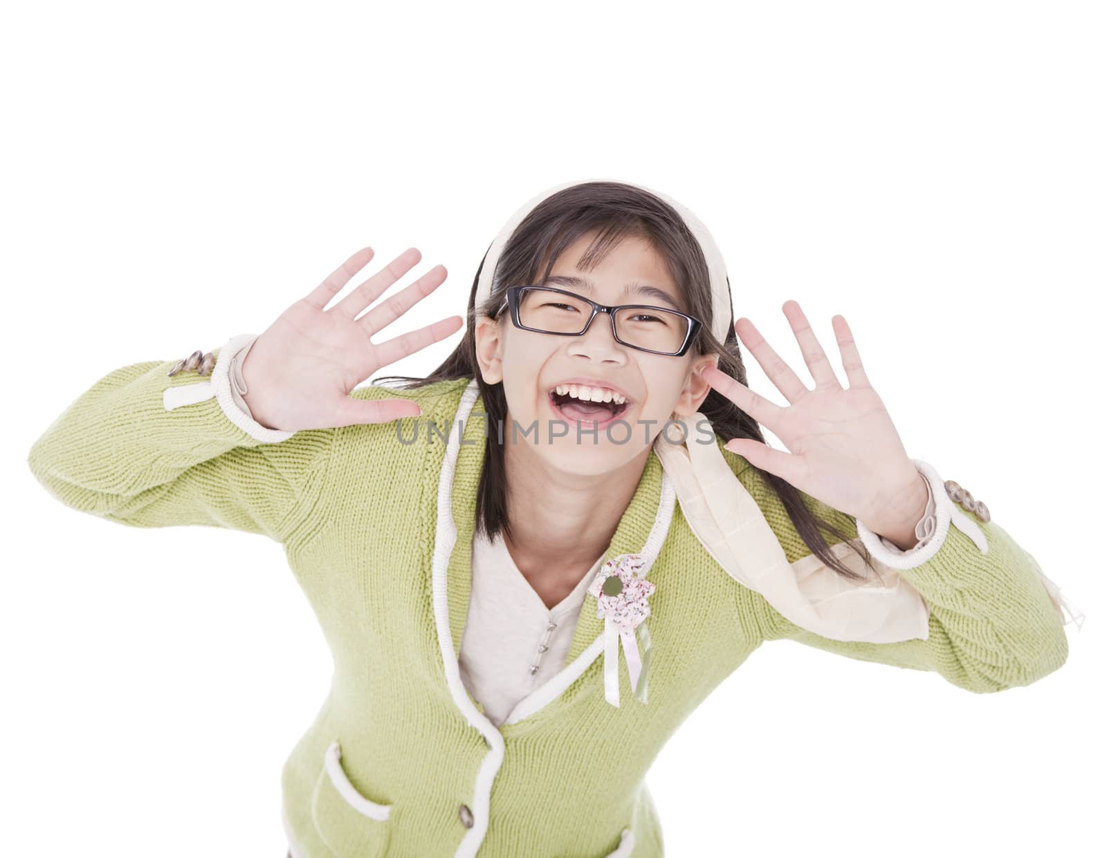 Young biracial asian girl in green sweater and glasses hands around face, smiling