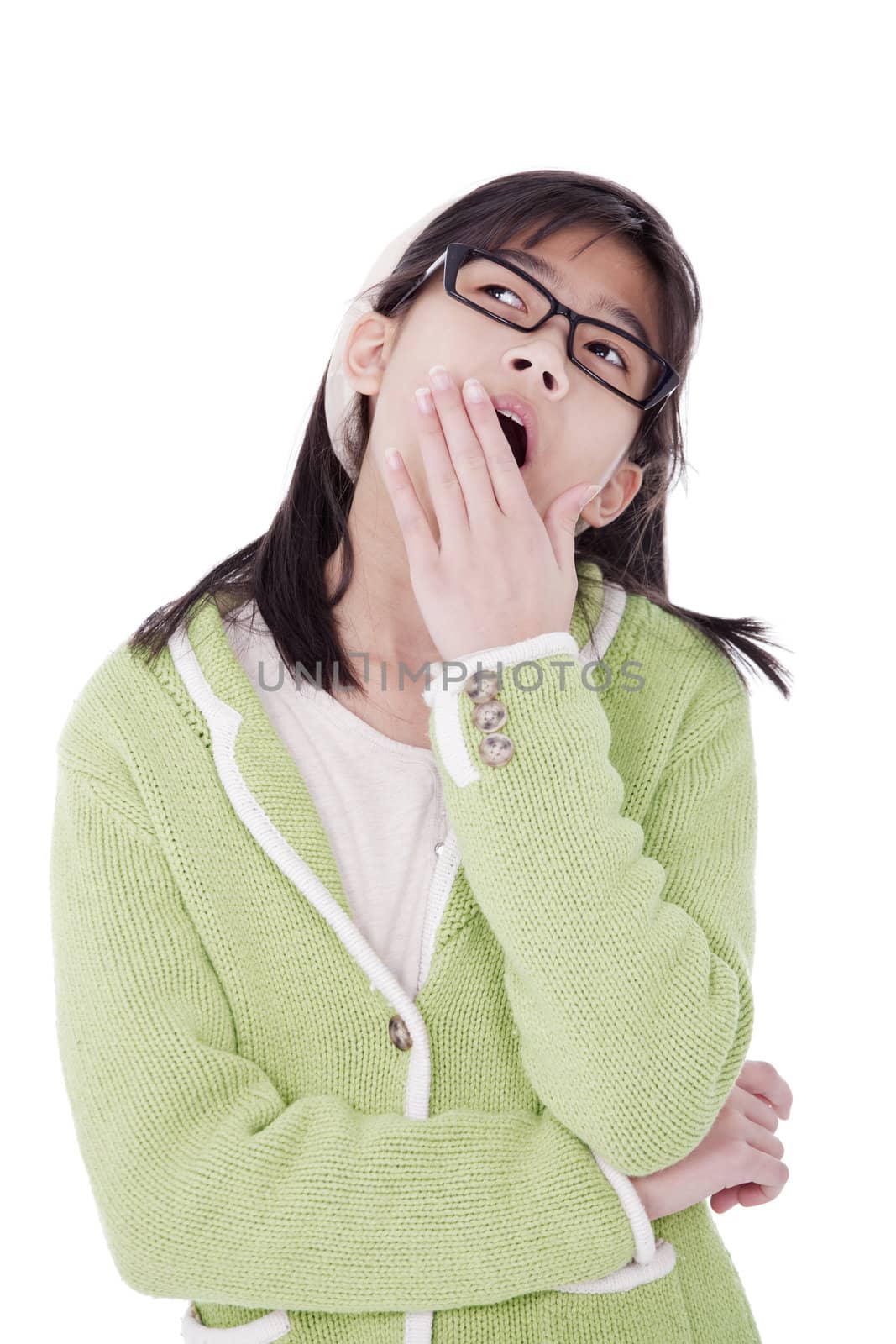 Biracial asian girl in green sweater and glasses looking up, yawning