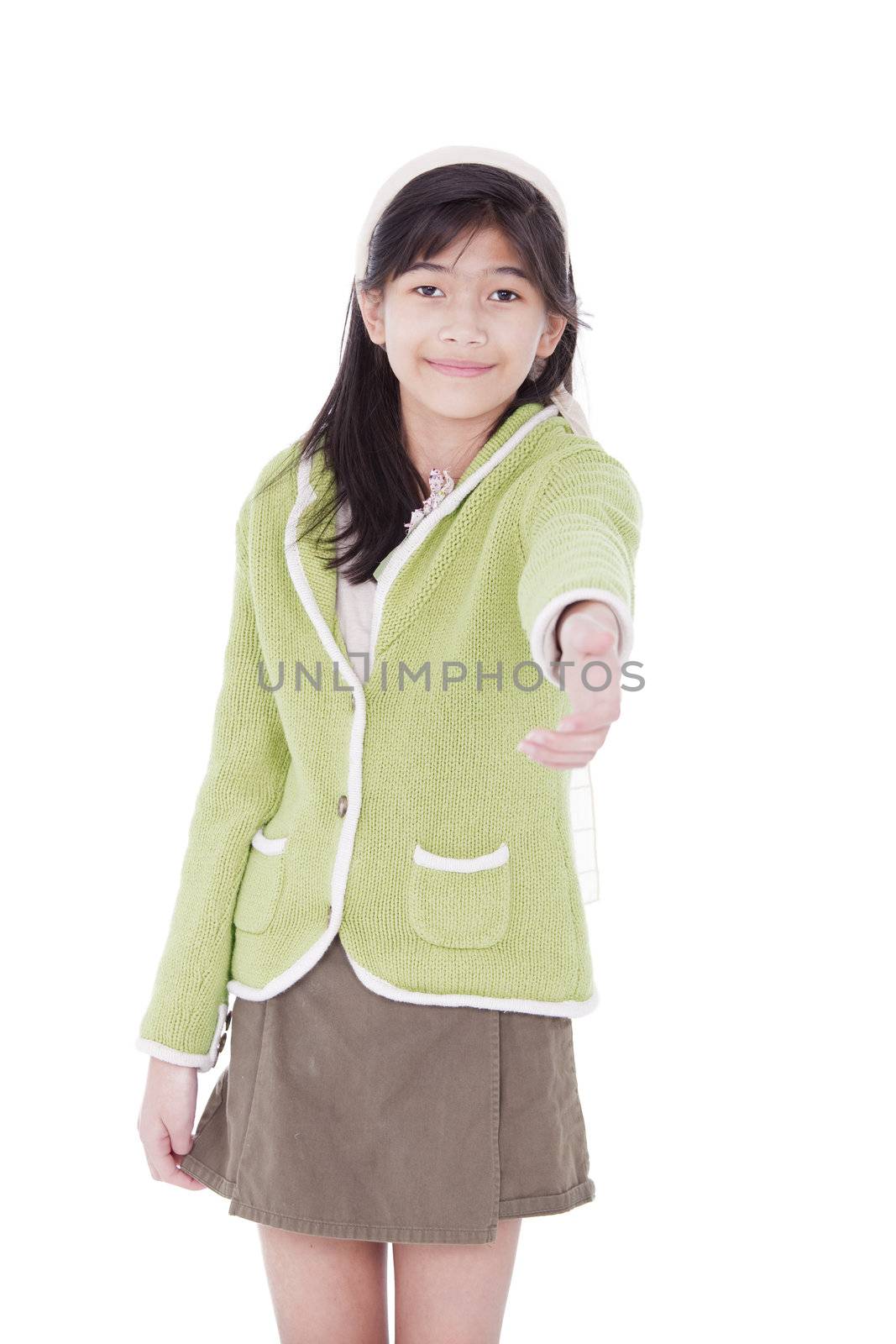 Biracial asian girl in lime green sweater extending hand in greeting for a handshake