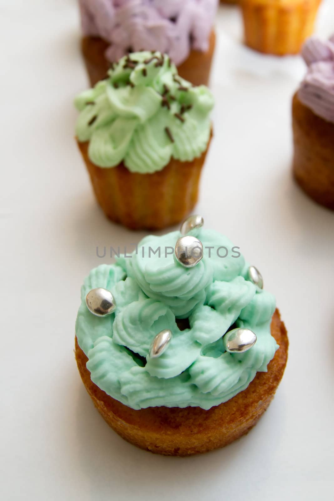 Some cupcakes on white background