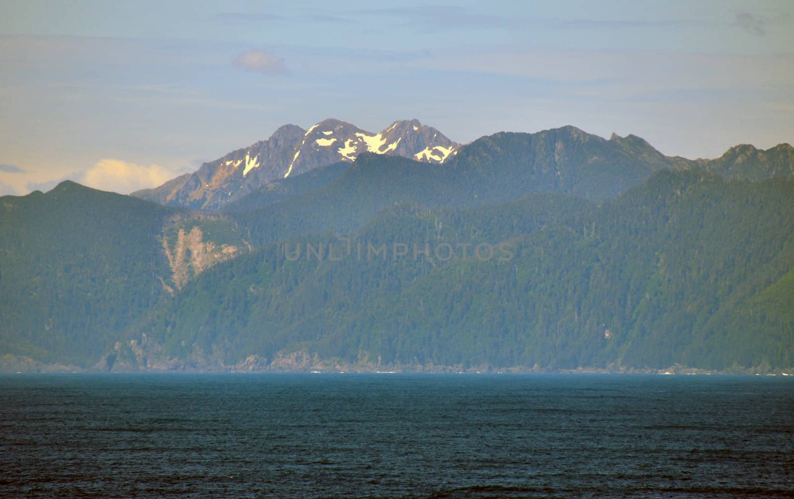 Alaskan mountains and Ocean by RefocusPhoto