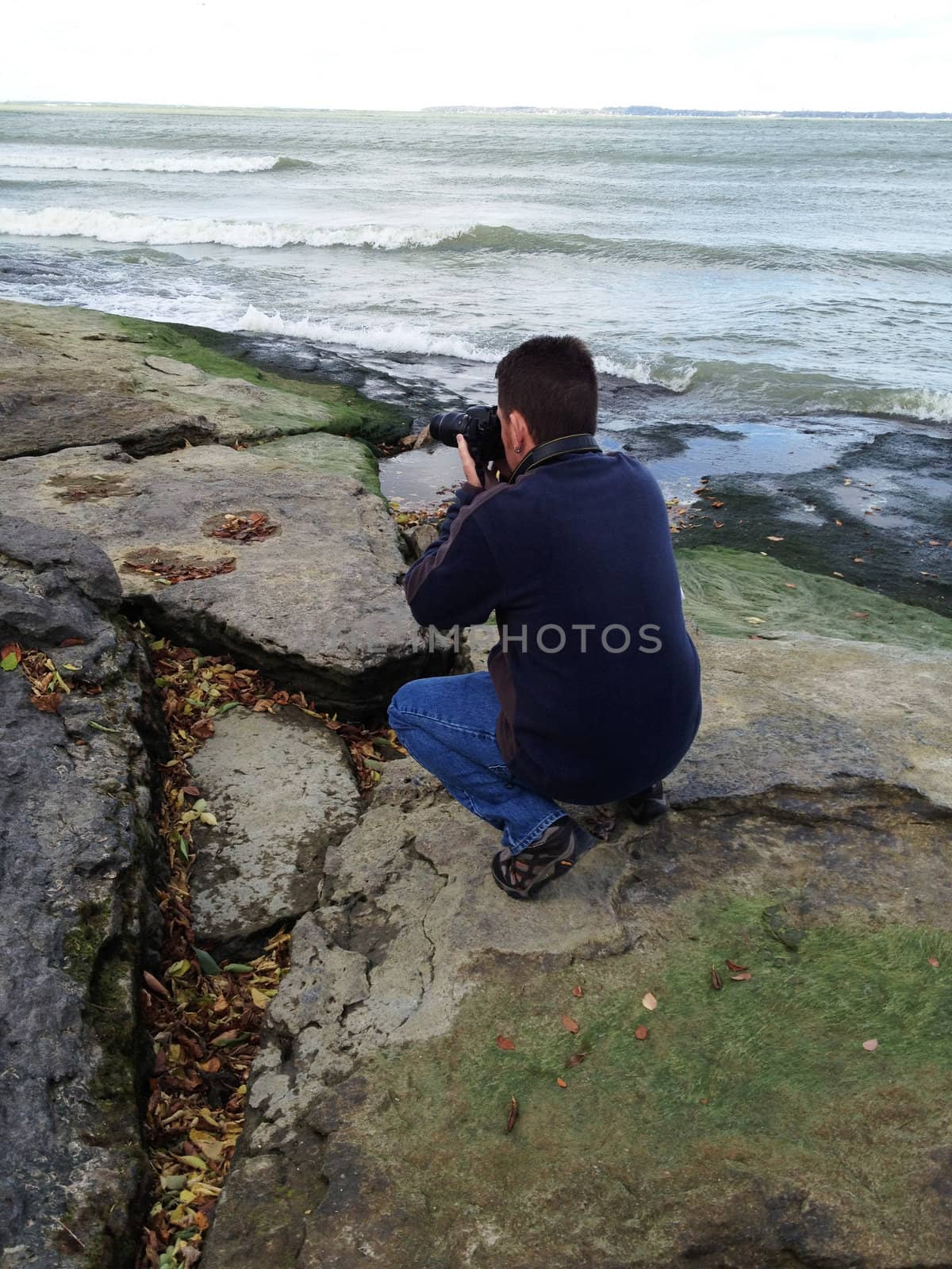 Man takes photos off coast of lake erie by RefocusPhoto