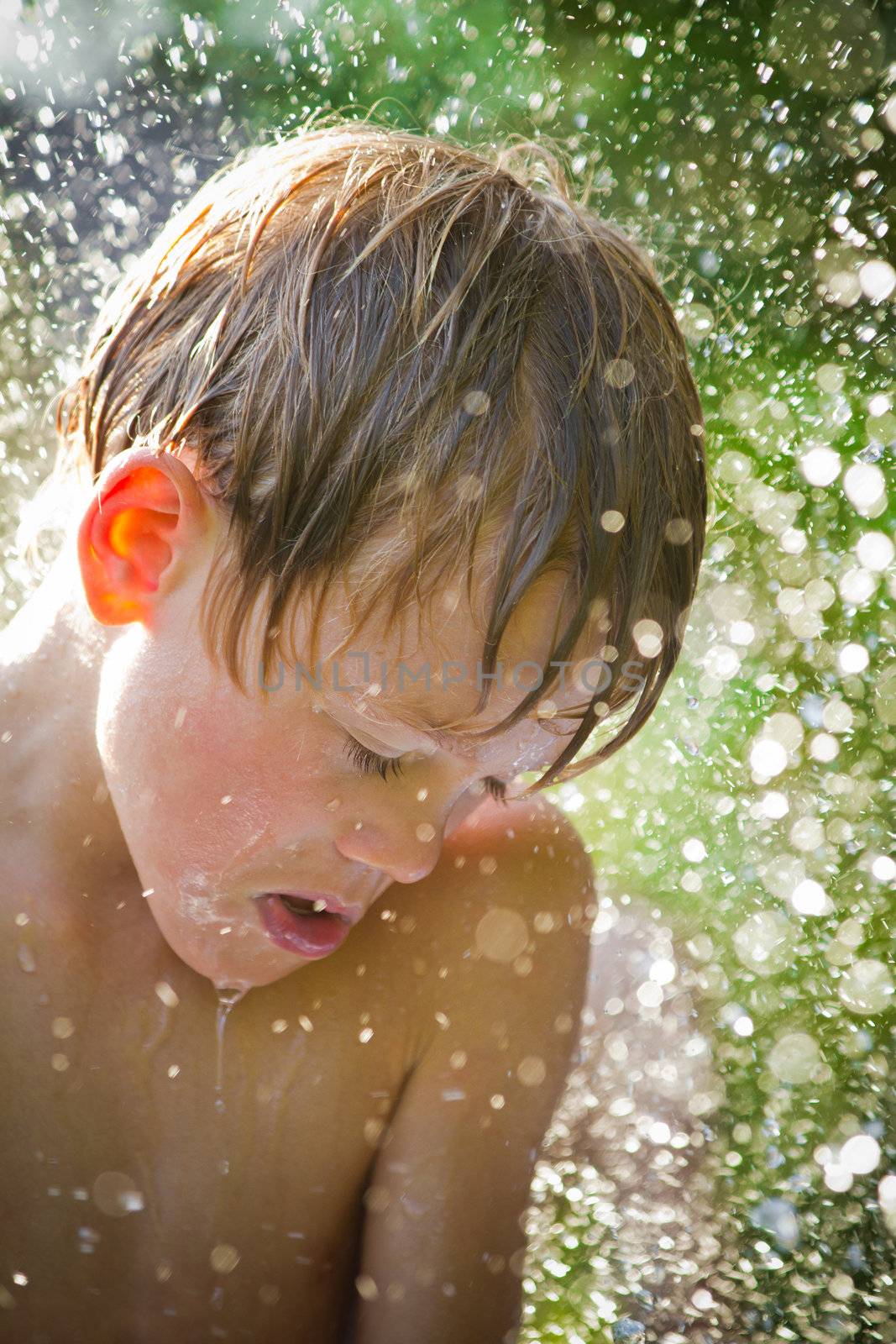 Young child playing in the water