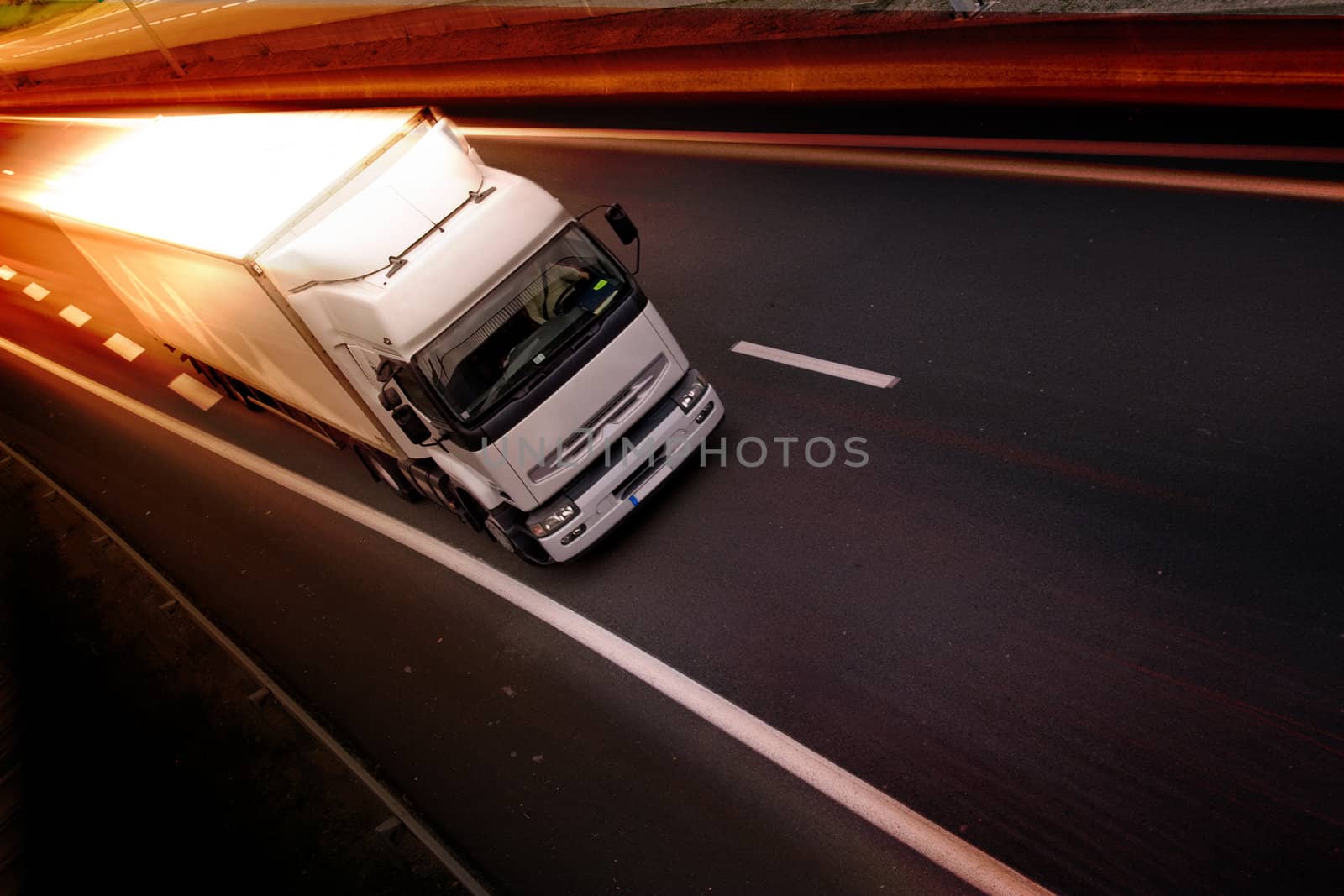 A white truck on highway - delivery concept