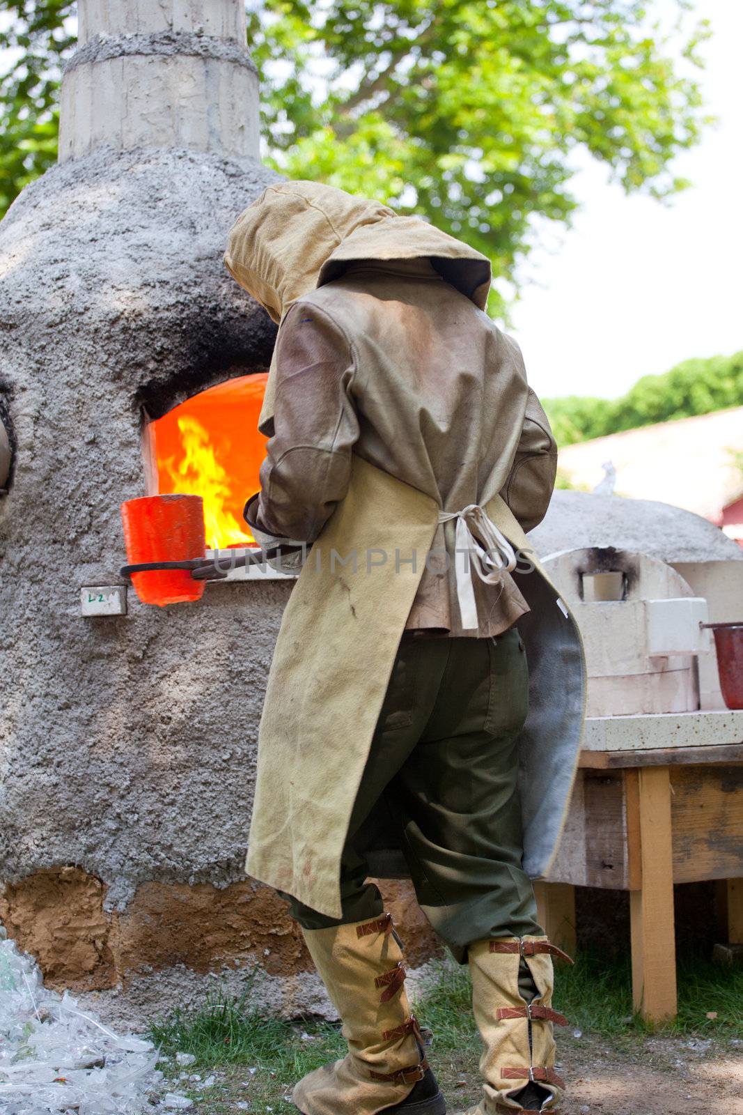 Workers during the Glass processing - Hot melting glasses