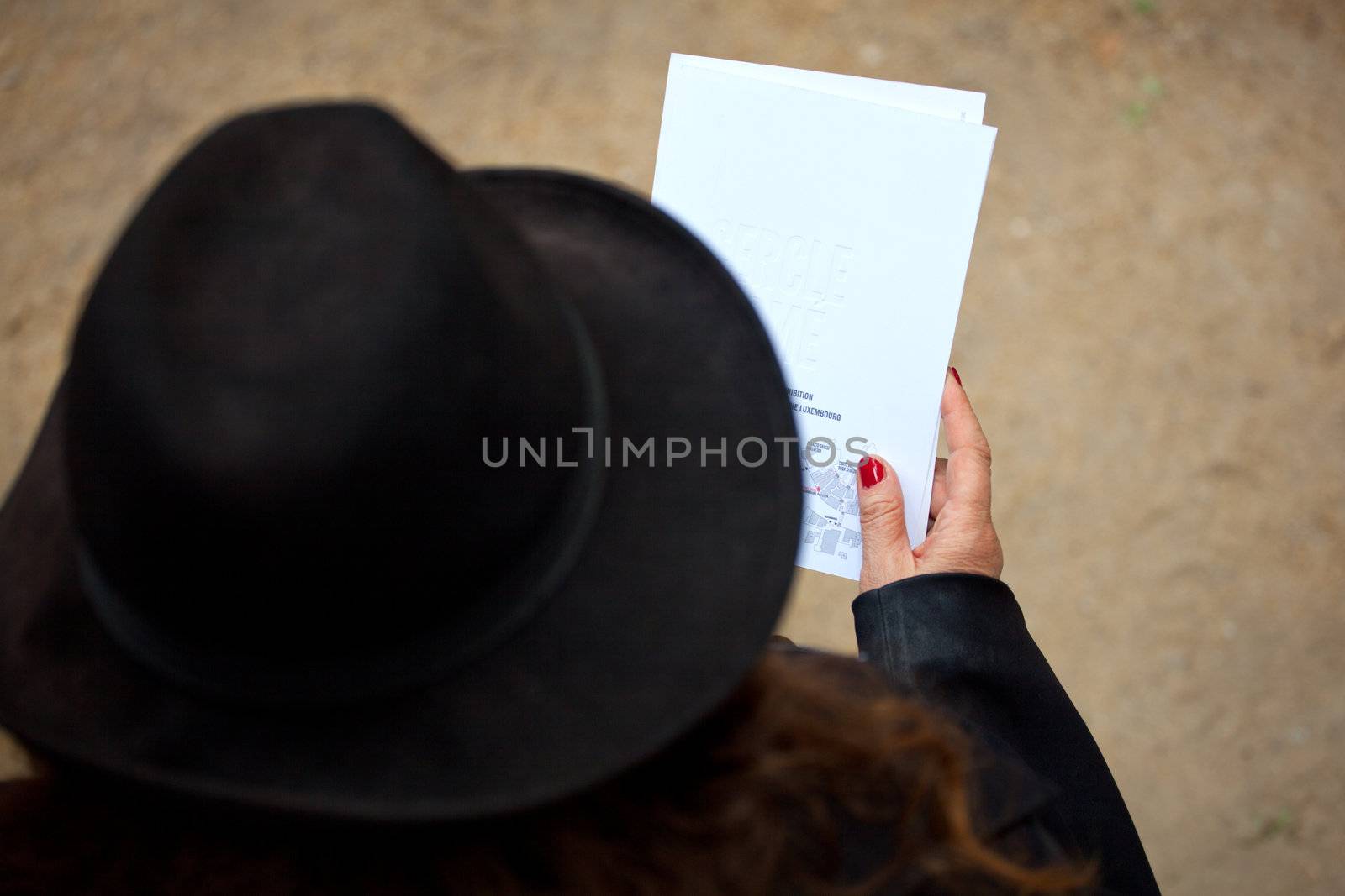 Woman in black read a book
