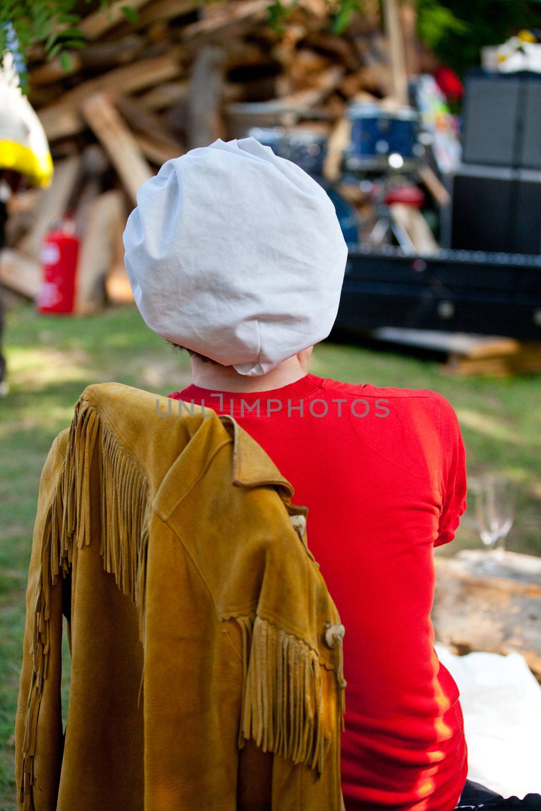 Woman sitting on a chair to shovel