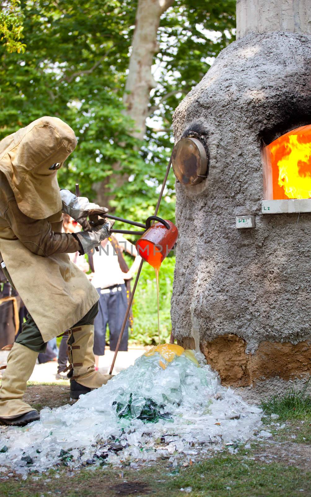 Workers during the Glass processing - Hot melting glasses