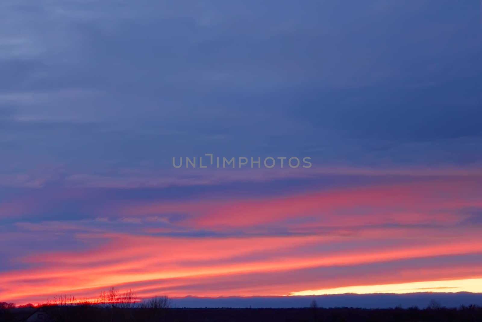 Colorful glow in the winter sky after sunset