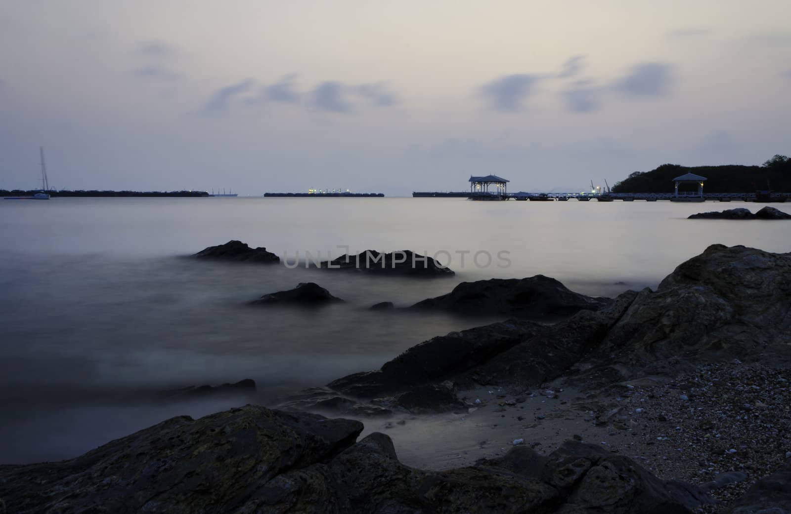 Sunrise at beautiful old bridge on Sichang island  by siraanamwong