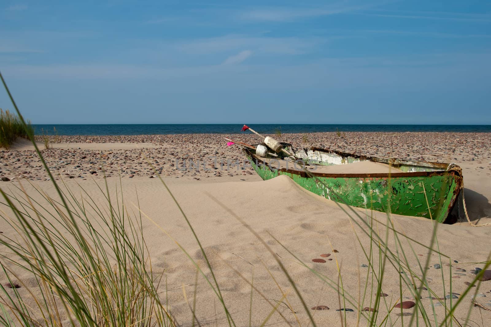 old abandoned fishing boat on the beach