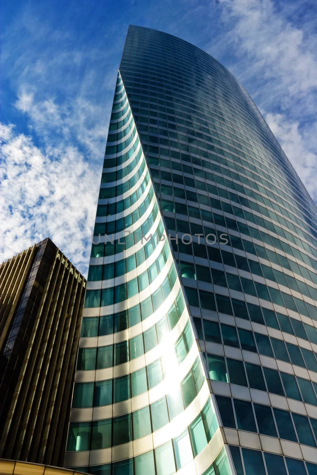 Modern skyscraper under blue sky - paris - france