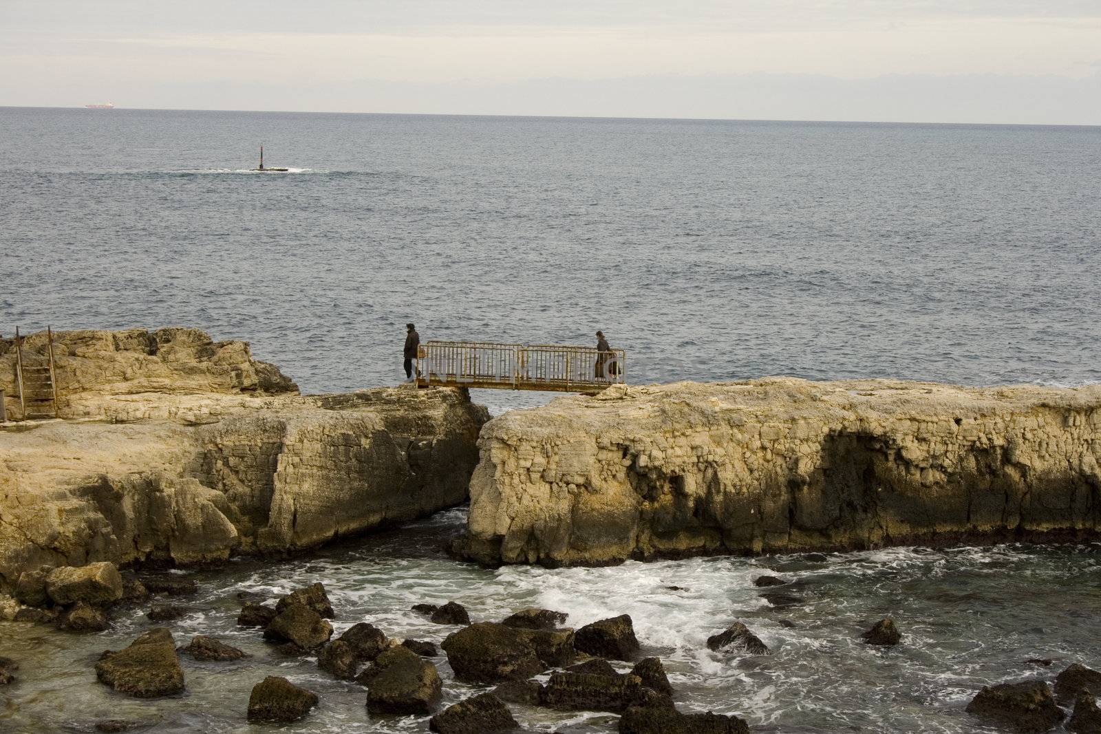 Walkway on the rocks in Ortigia sea, Syracuse - Sicily