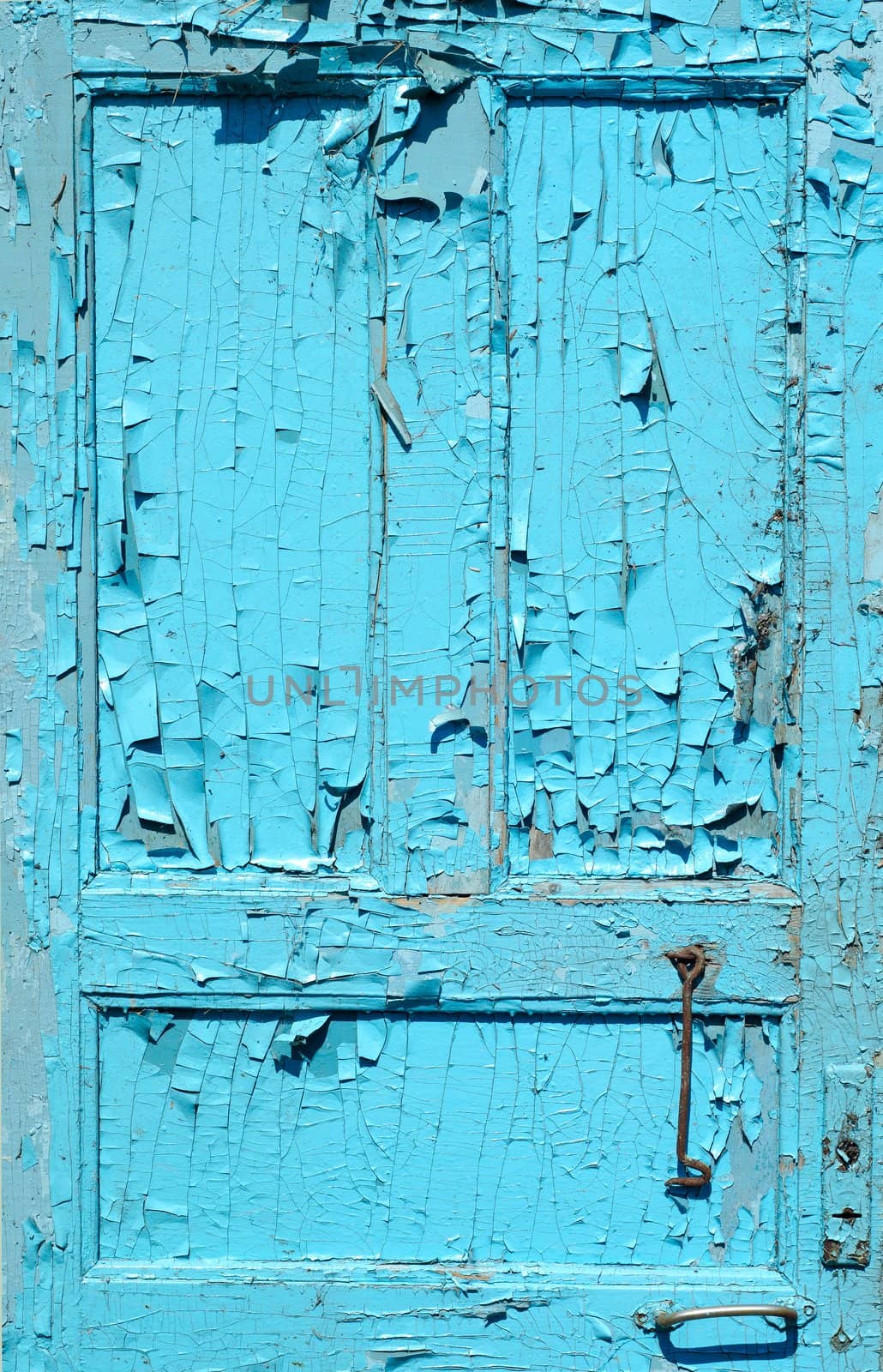 cracked old painted blue door