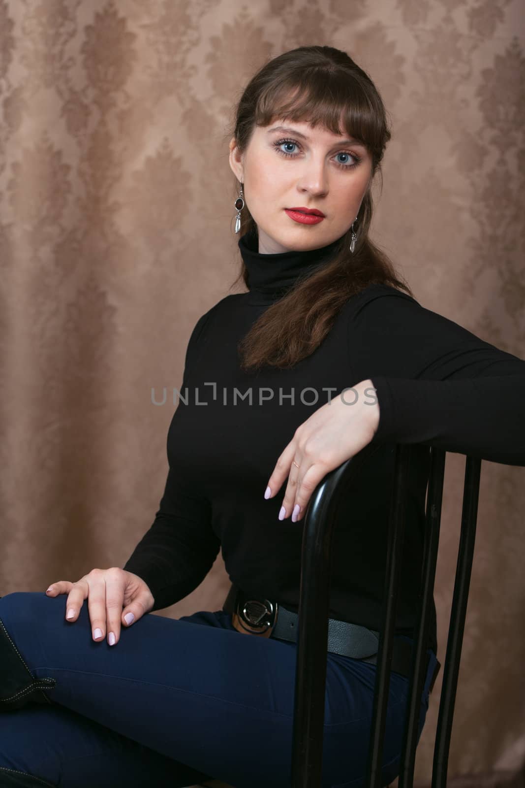 Portrait of a young girl in a black blouse