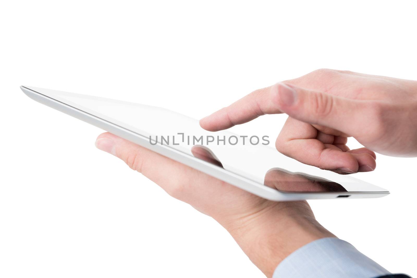 Young man working on a digital tablet. Isolated on white