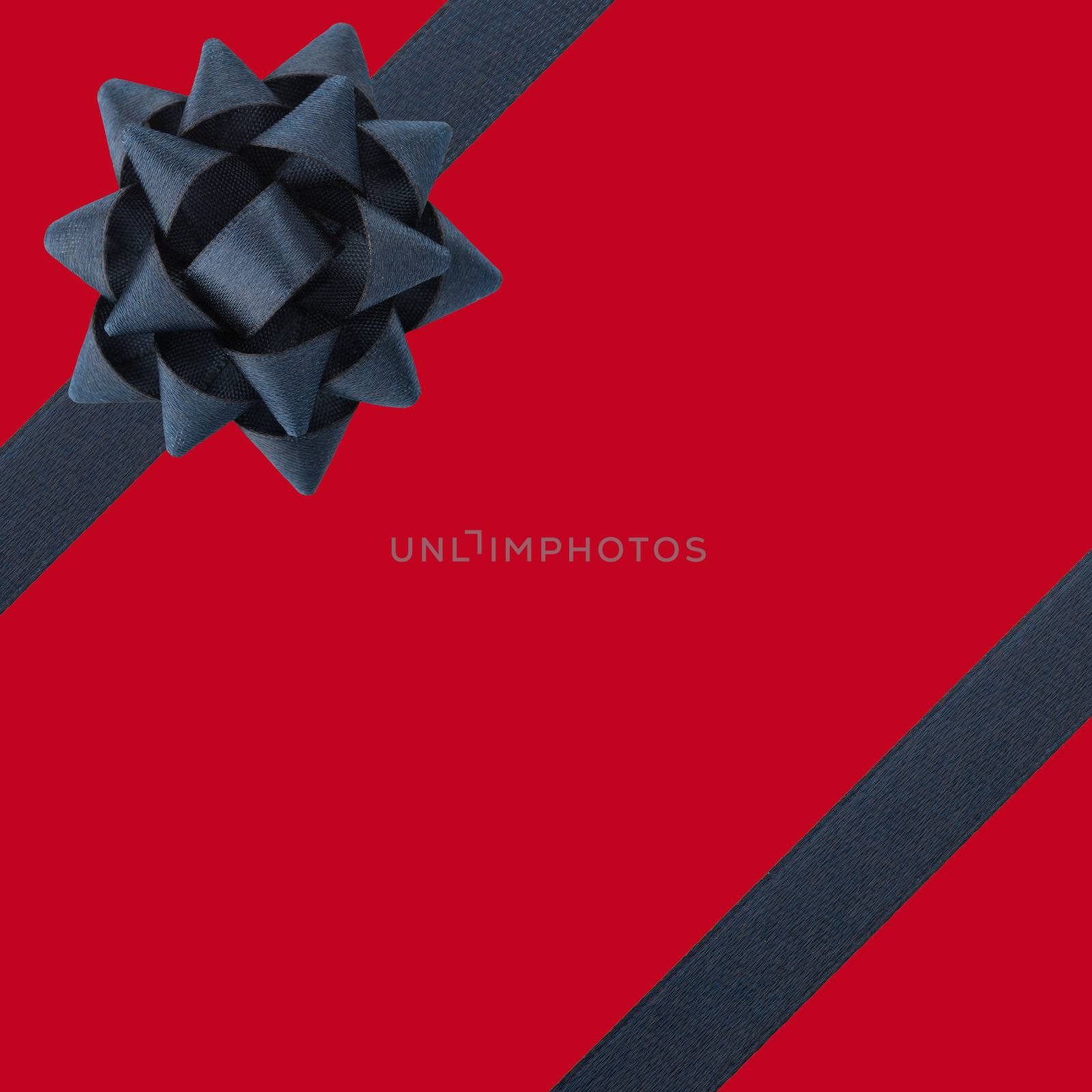 Black bow and ribbons over red background