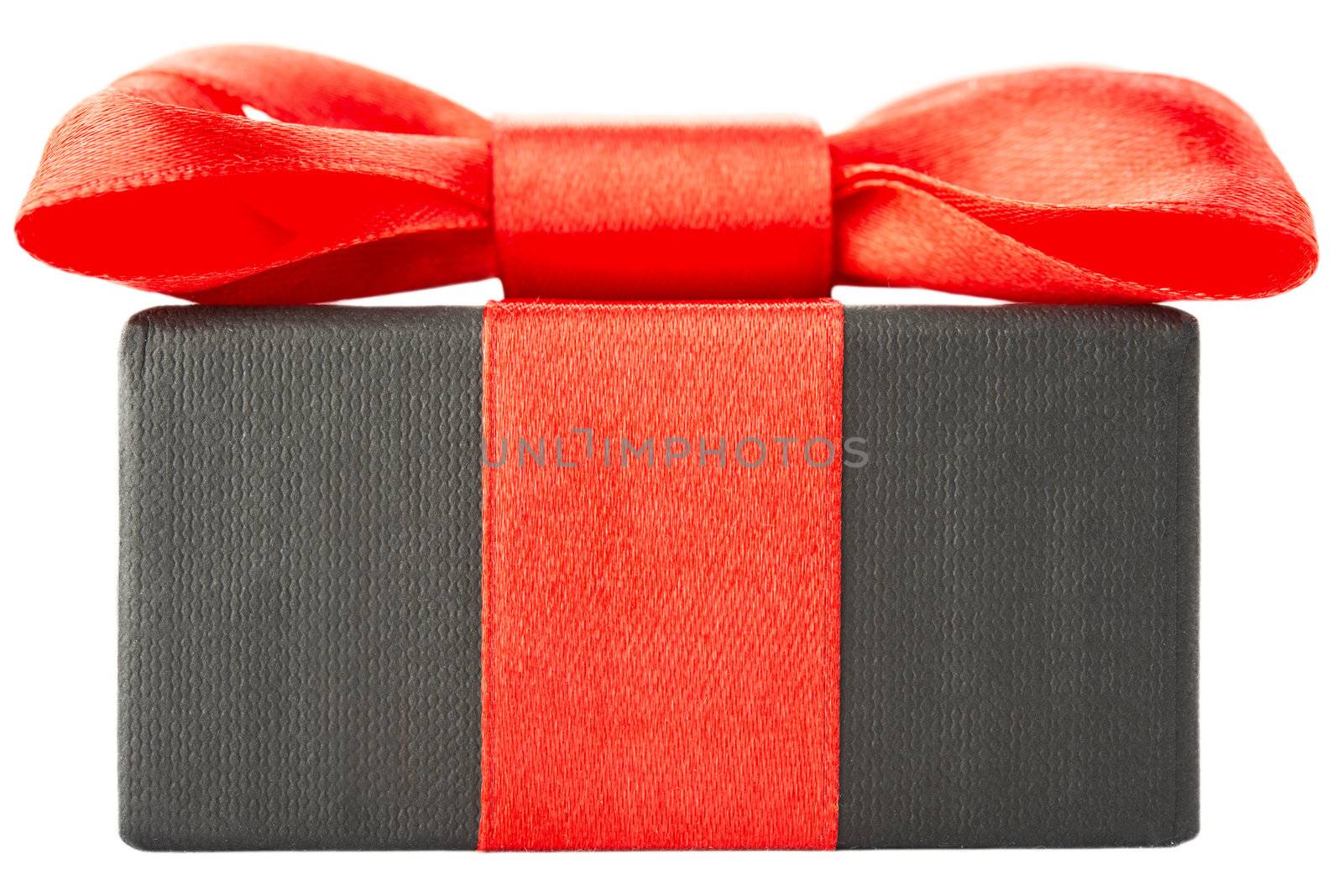 Black gift box with red bow, isolated on white background
