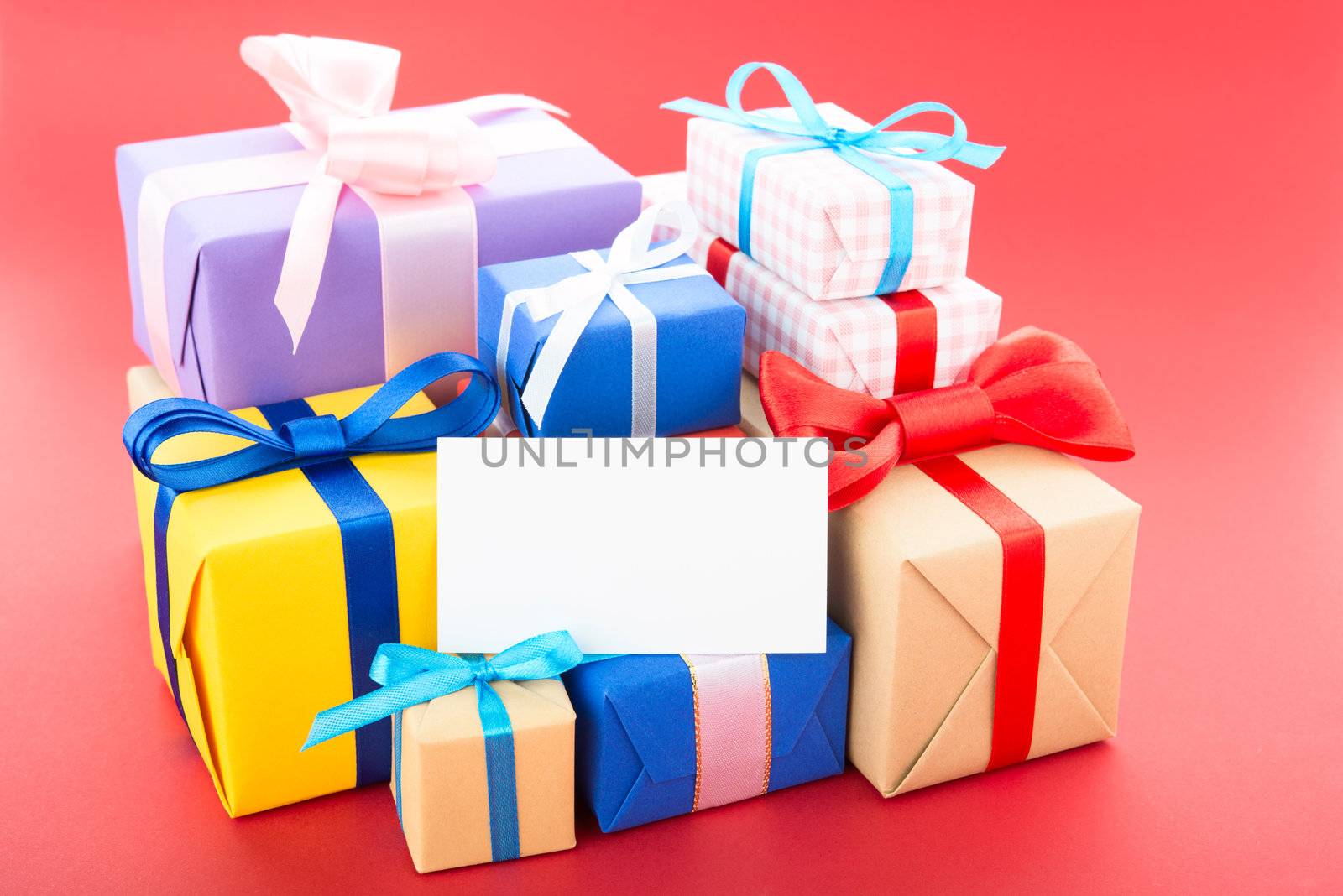 Gift boxes, isolated on red background