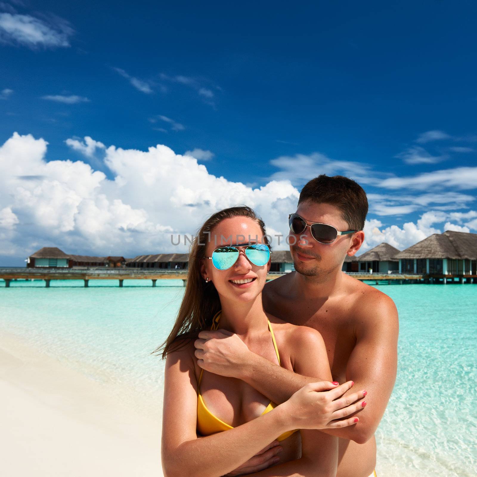 Couple on a tropical beach at Maldives