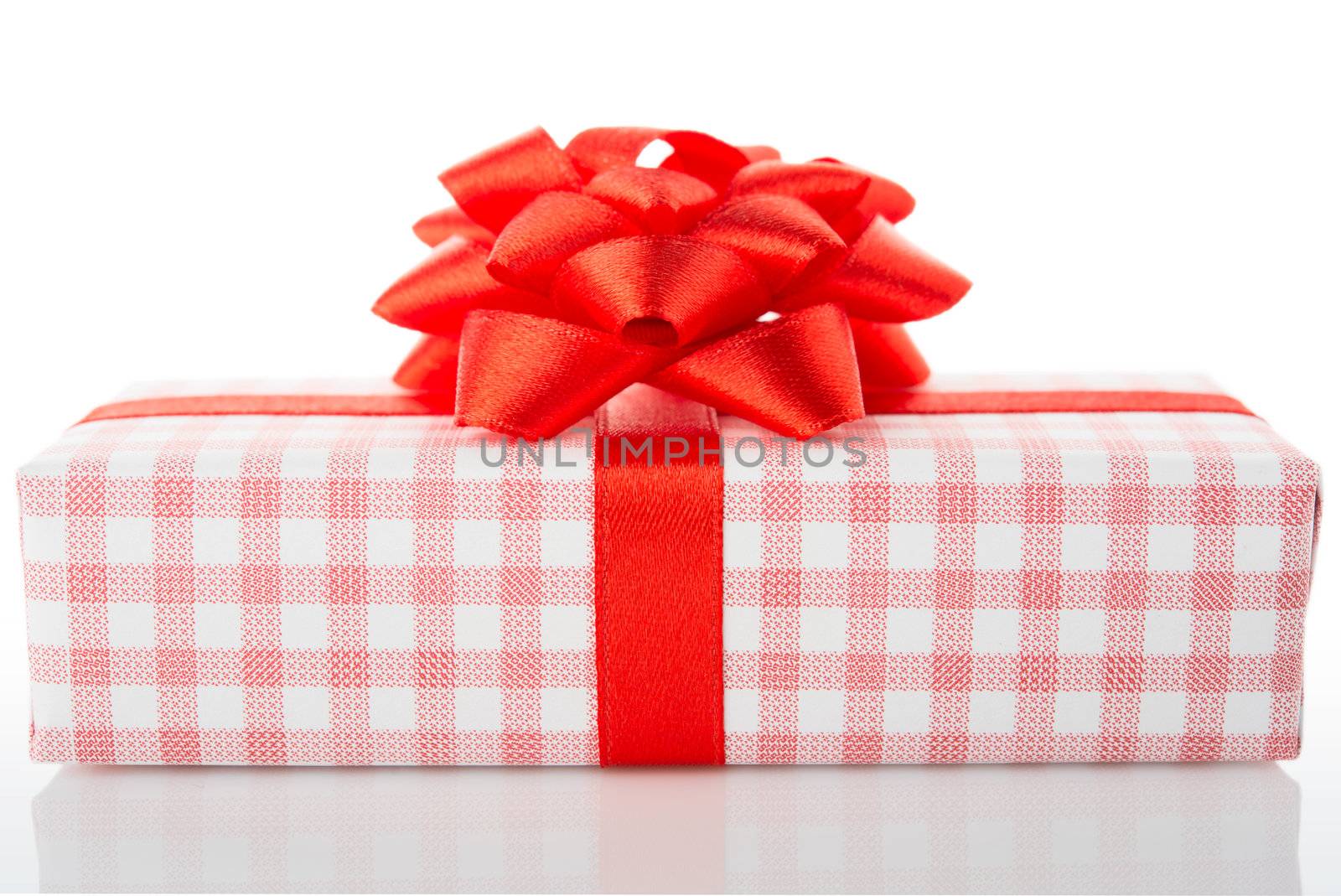 Vintage gift box with red bow, isolated on white background